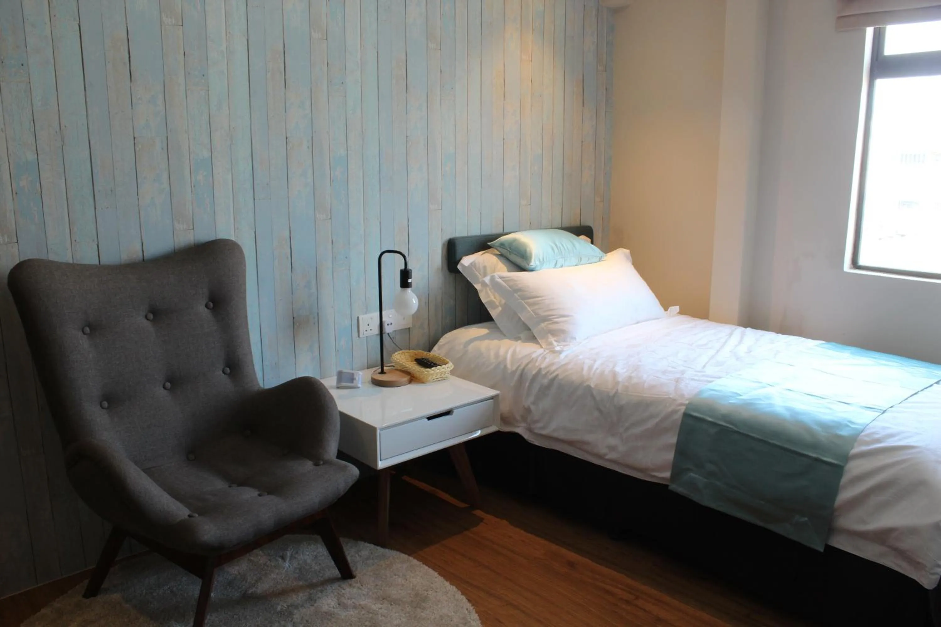 Bed in Sojourn Spa Hotel