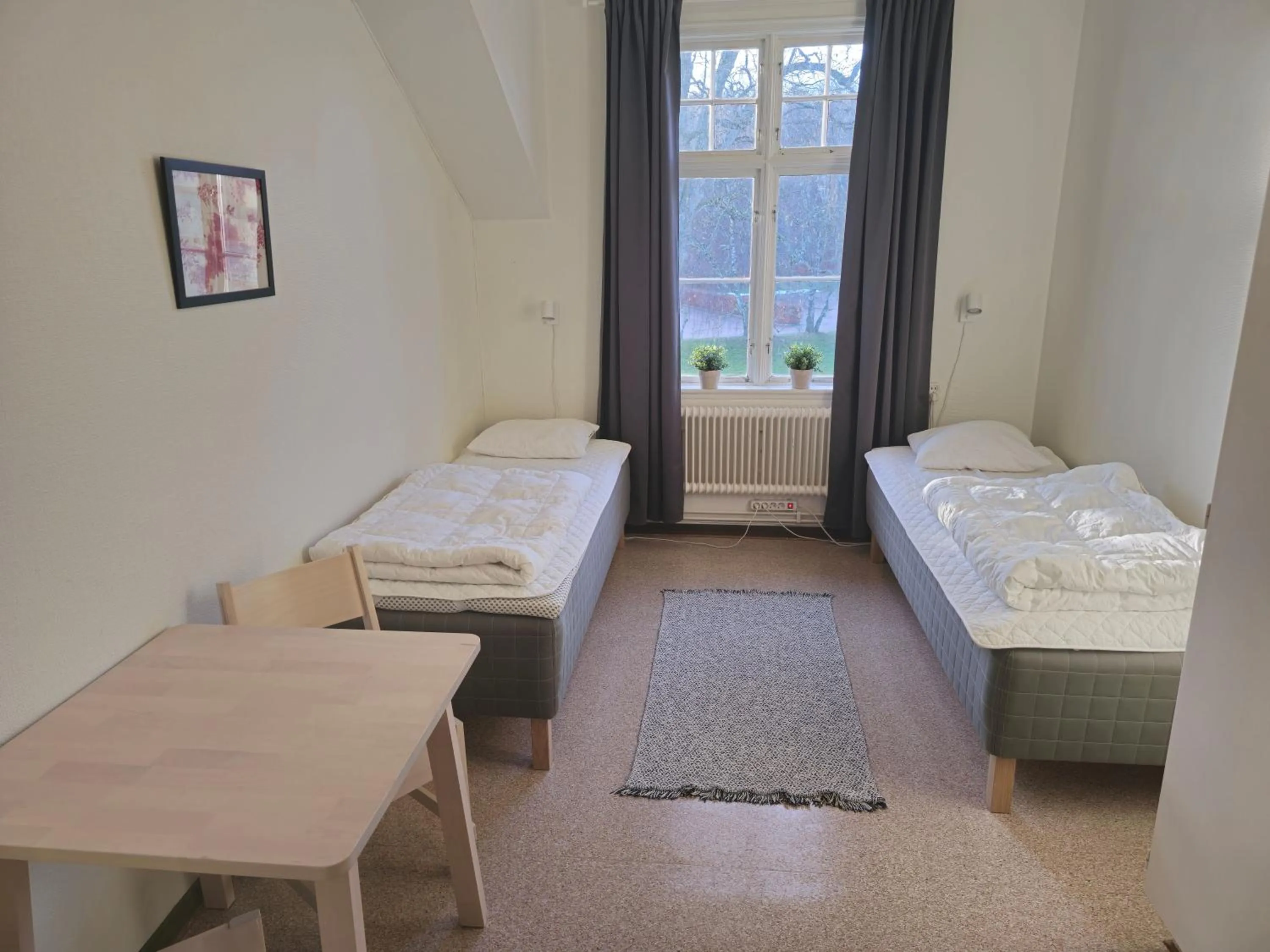 Bed in Ronneby Brunnspark Vandrarhem och B&B