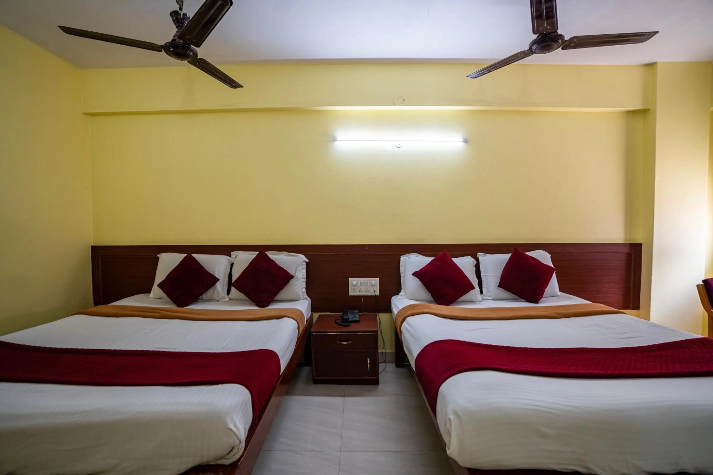 Bed in Hotel Vyshak residency