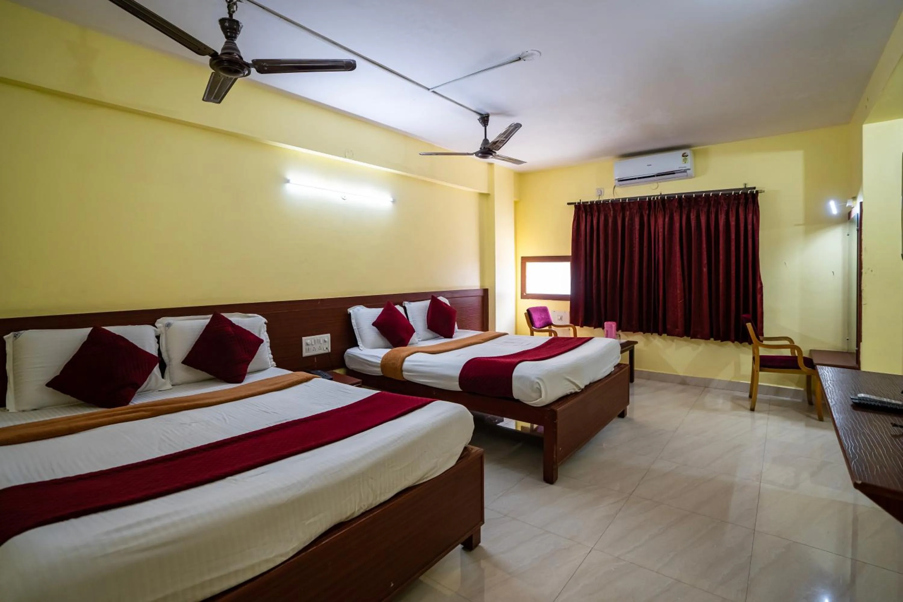 Bed in Hotel Vyshak residency