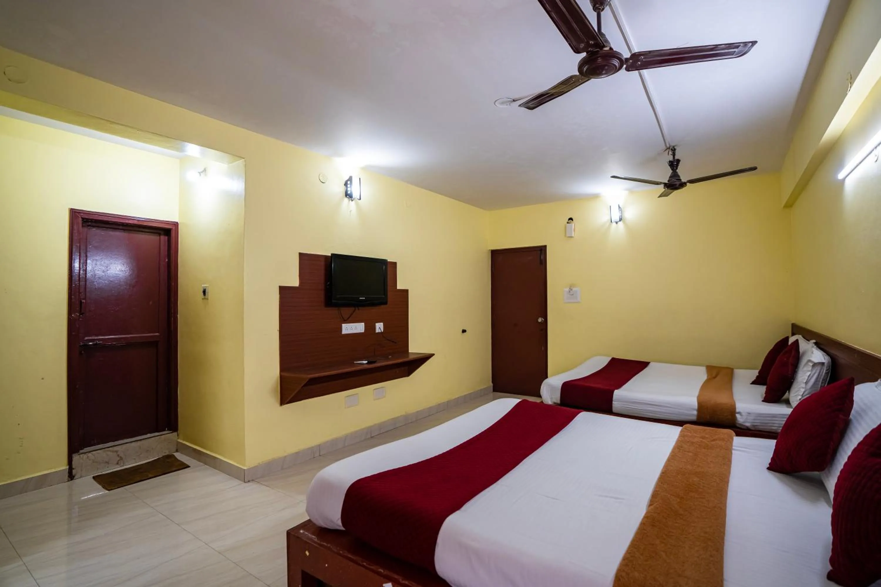 Bed in Hotel Vyshak residency