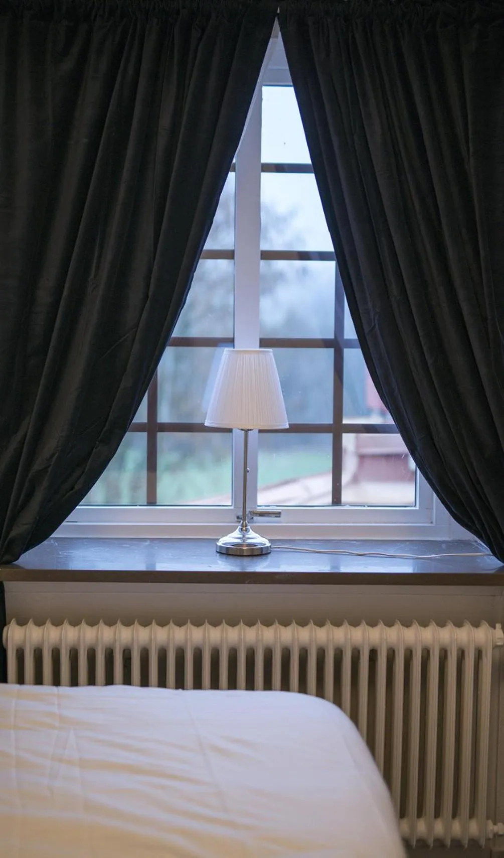 Garden view, Bed in Tokeryds Herrgård