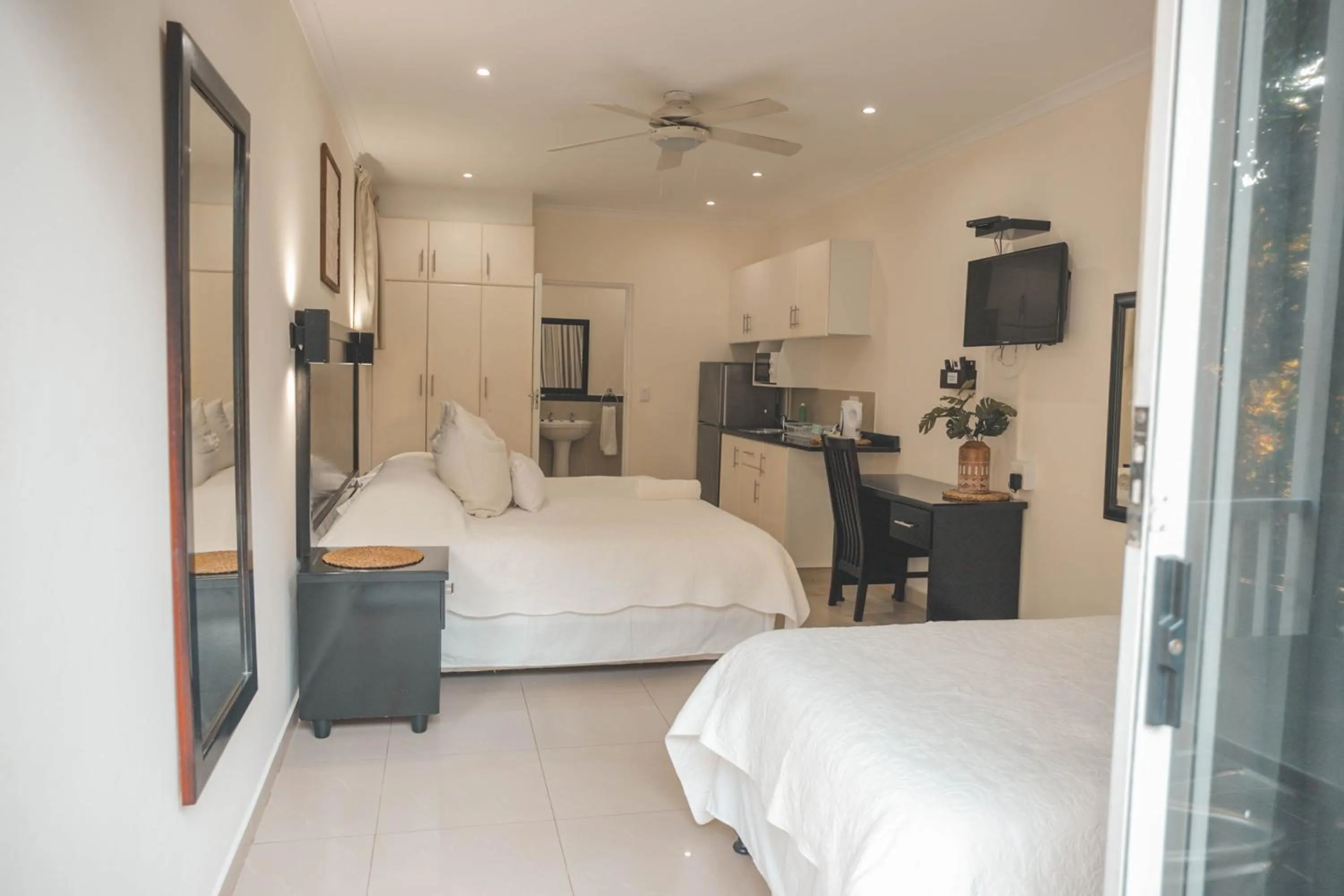 Bed in Beside Still Waters Boutique Hotel