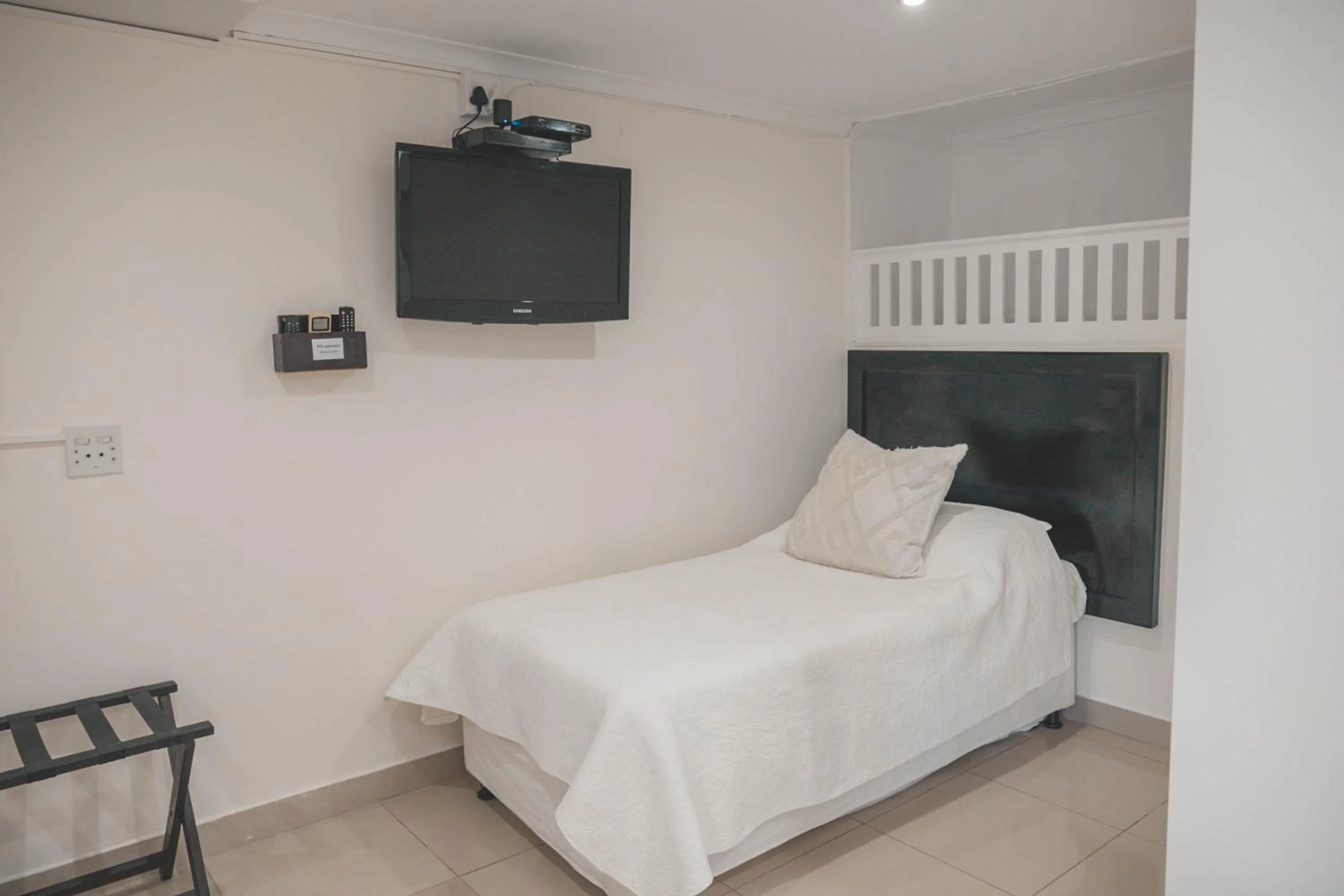 Bed in Beside Still Waters Boutique Hotel