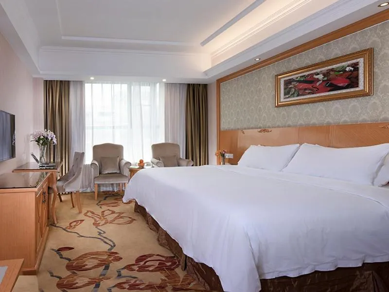 Bed in Vienna Hotel Yueyang Huarong Avenue