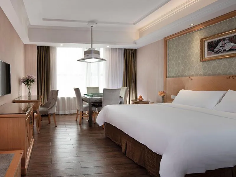 Bed in Vienna Hotel Yueyang Huarong Avenue
