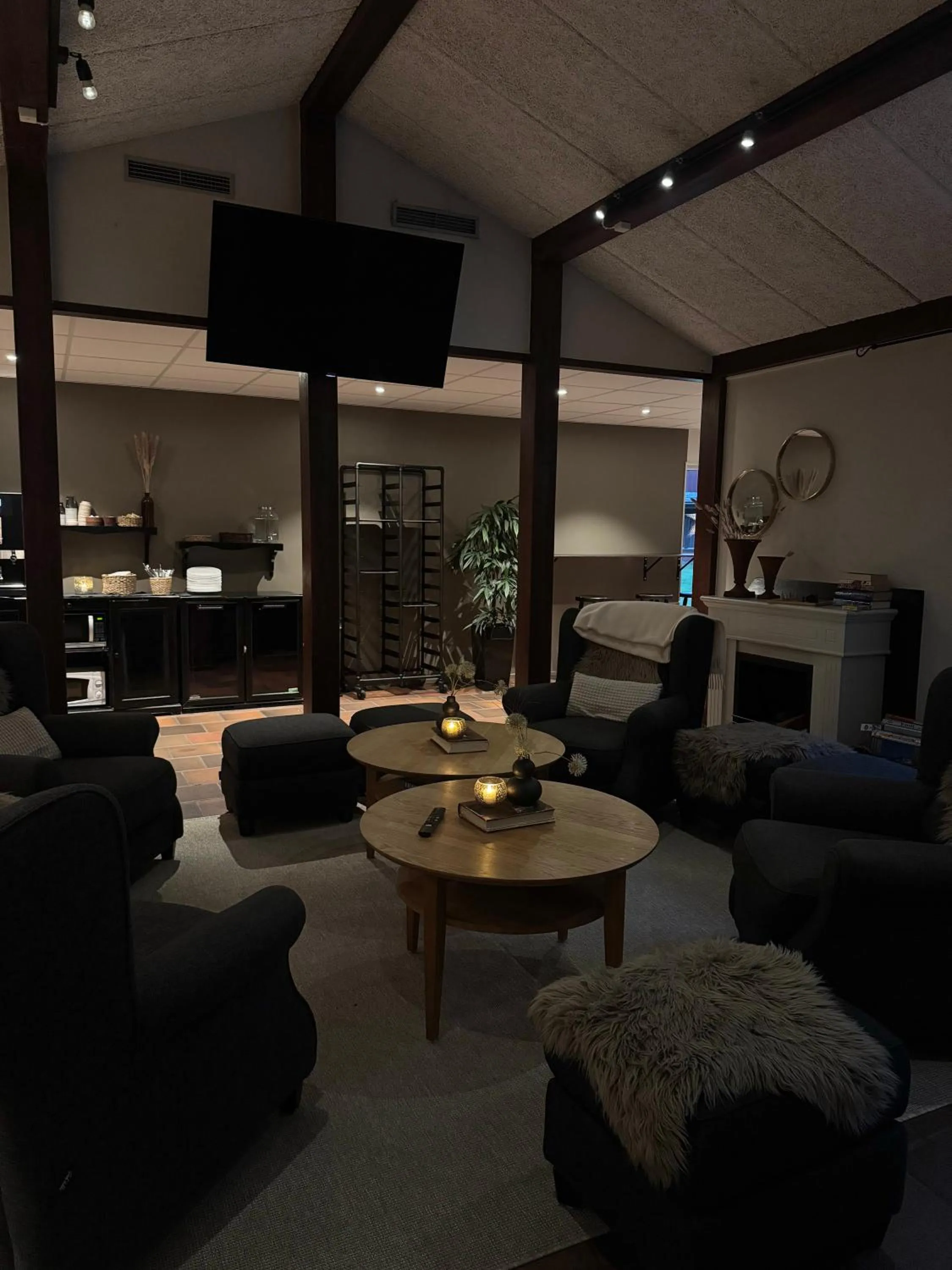 Communal lounge/ TV room in First Camp Moraparken Hotel