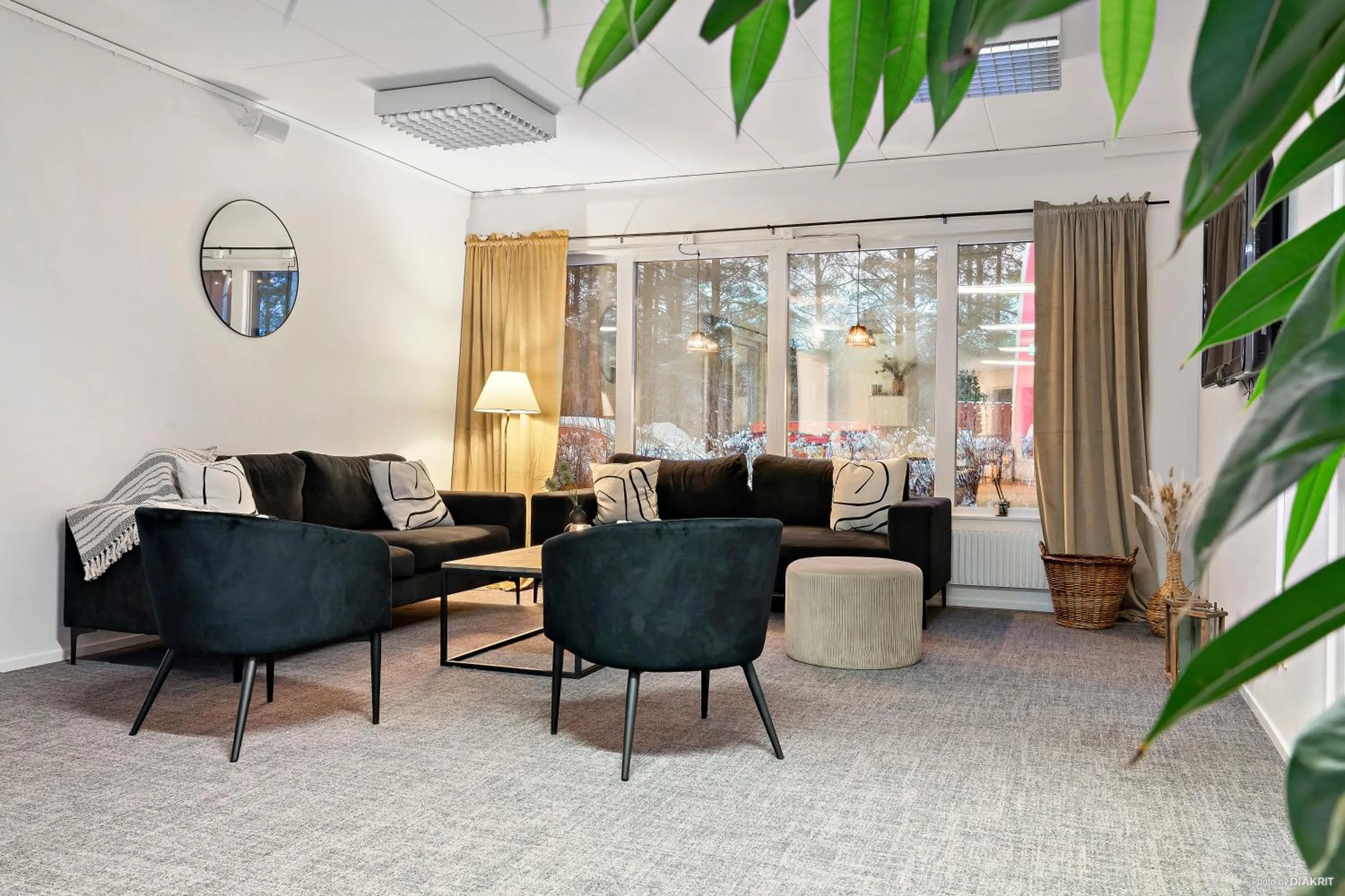 Communal lounge/ TV room in First Camp Moraparken Hotel