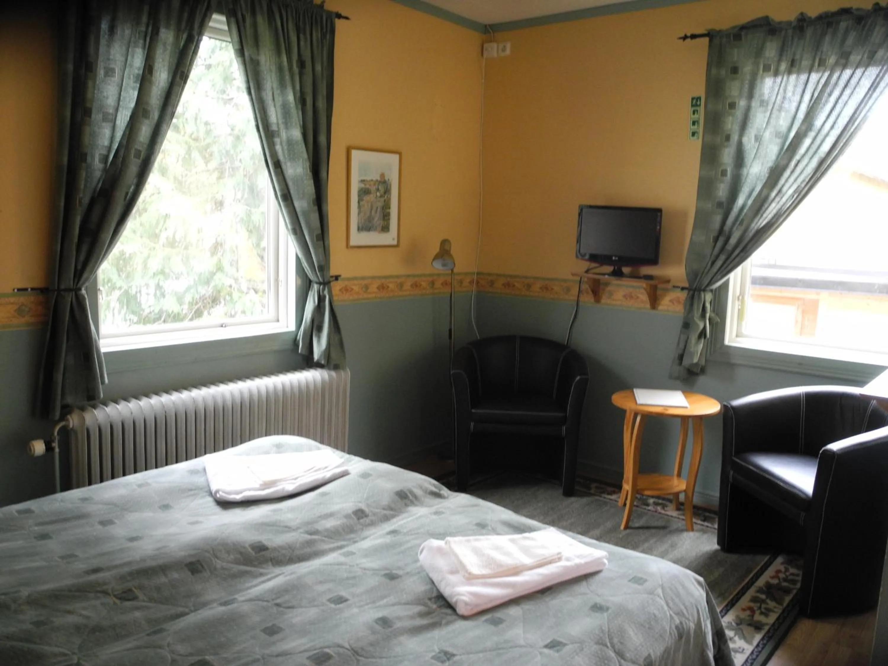 Photo of the whole room, Bed in Målilla Hotell & Restaurang