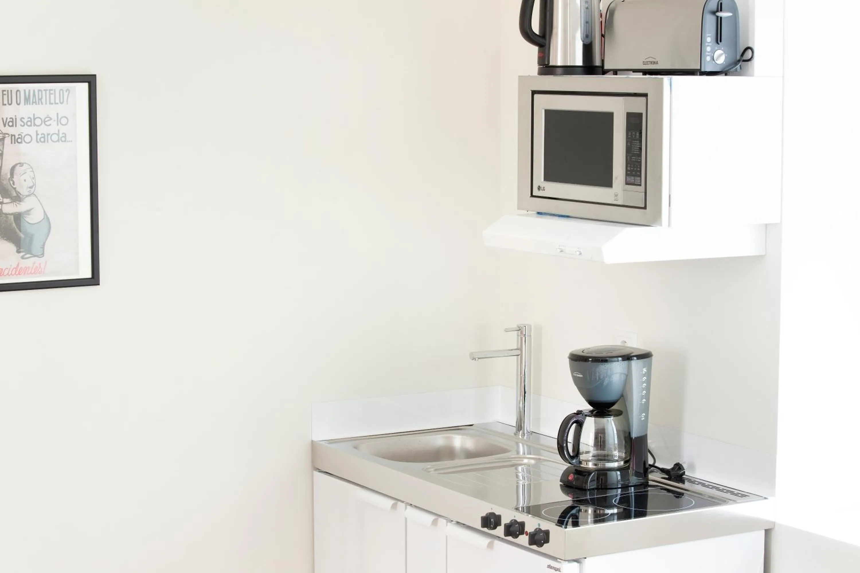 Kitchen or kitchenette in Ascensor da Bica - Lisbon Serviced Apartments