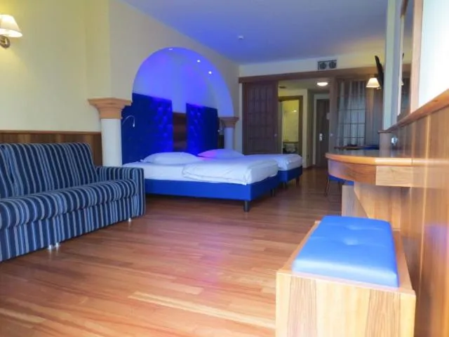 Bed in Hotel Alexander