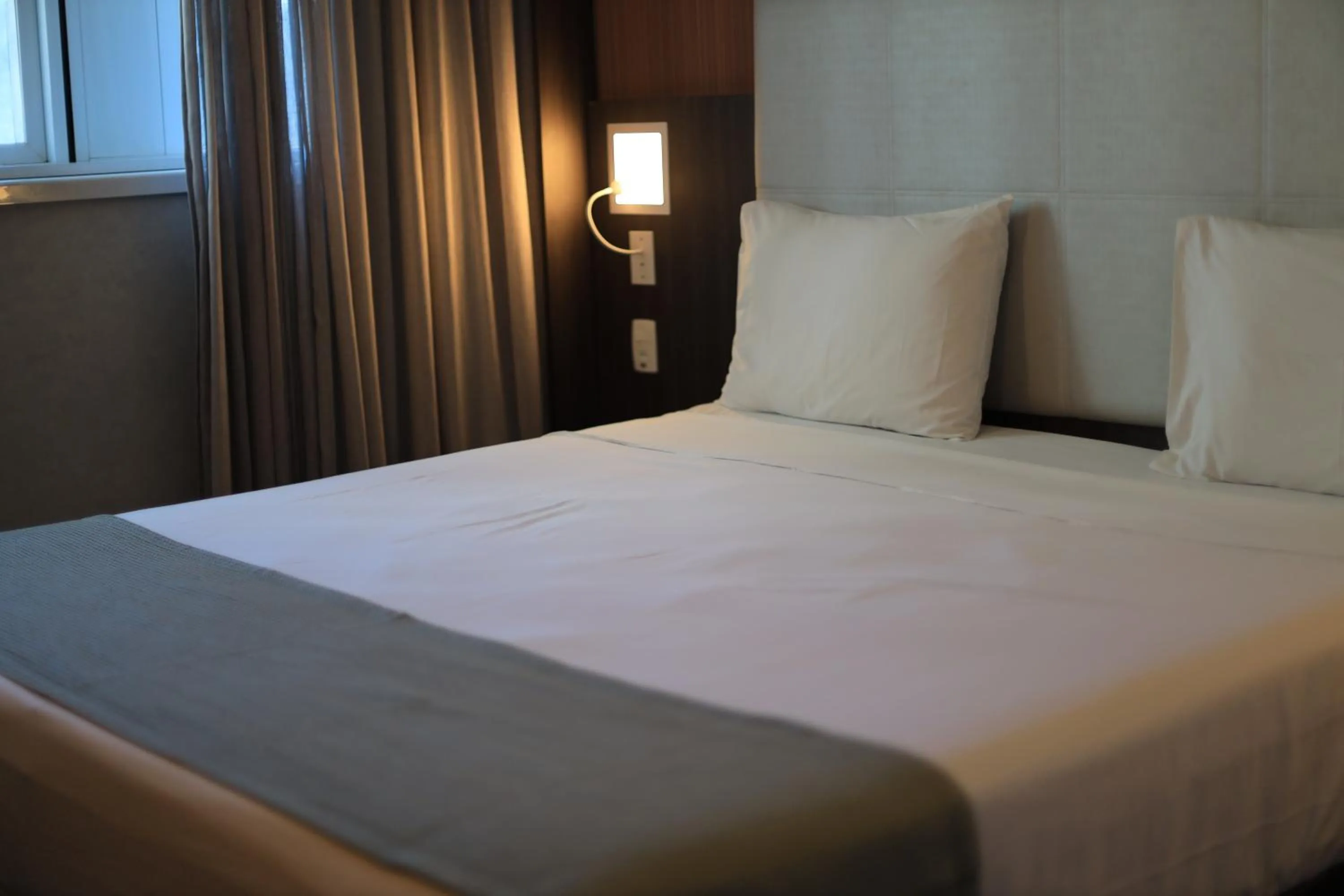 Bed in eSuites Hotel Recreio Shopping