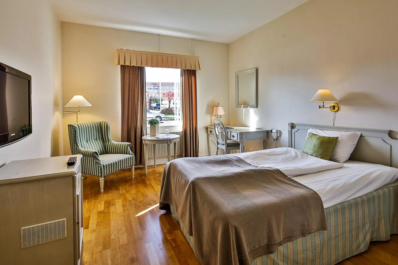 Photo of the whole room, Bed in First Hotel Olofström