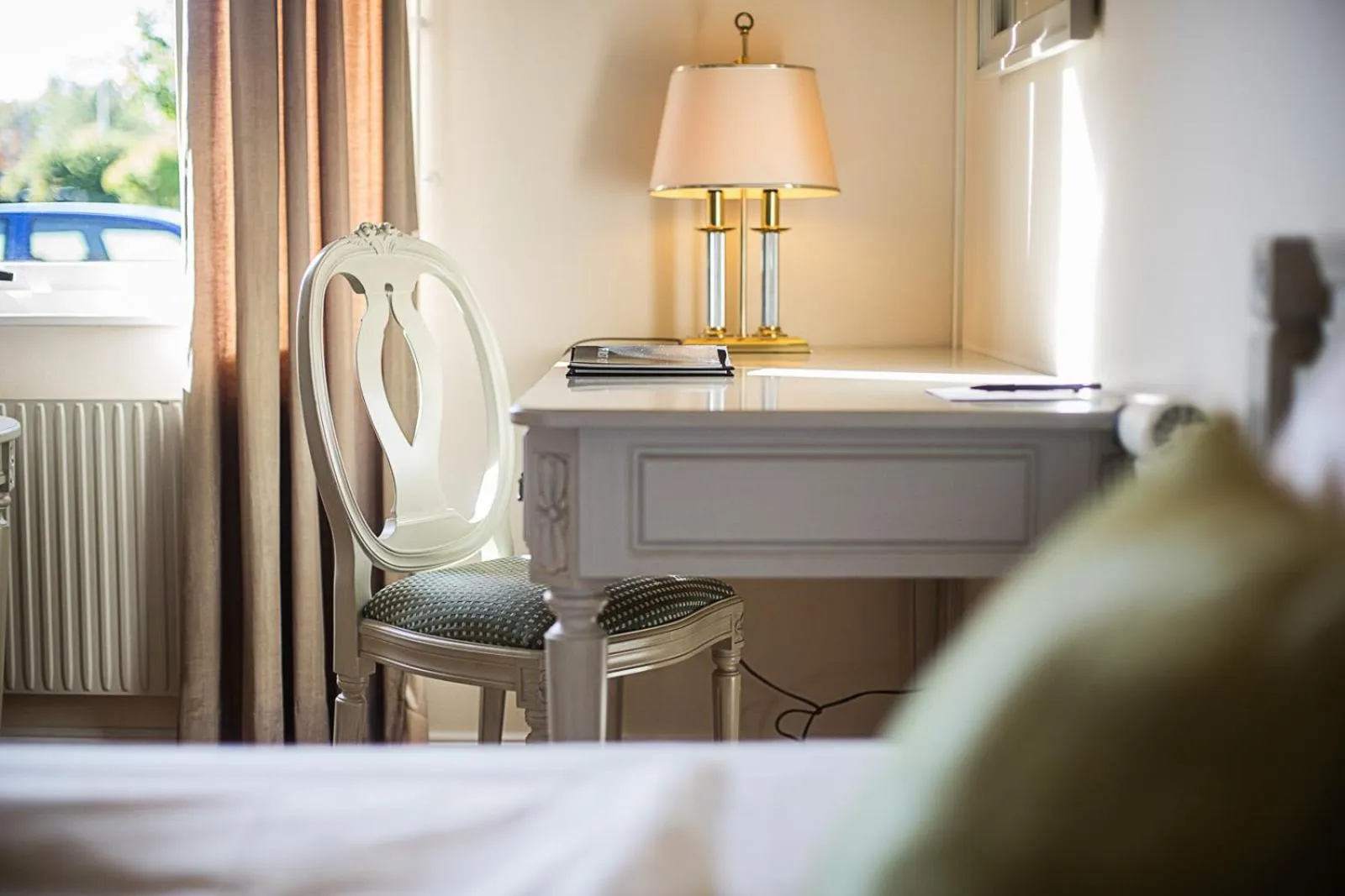 Seating area, Bed in First Hotel Olofström