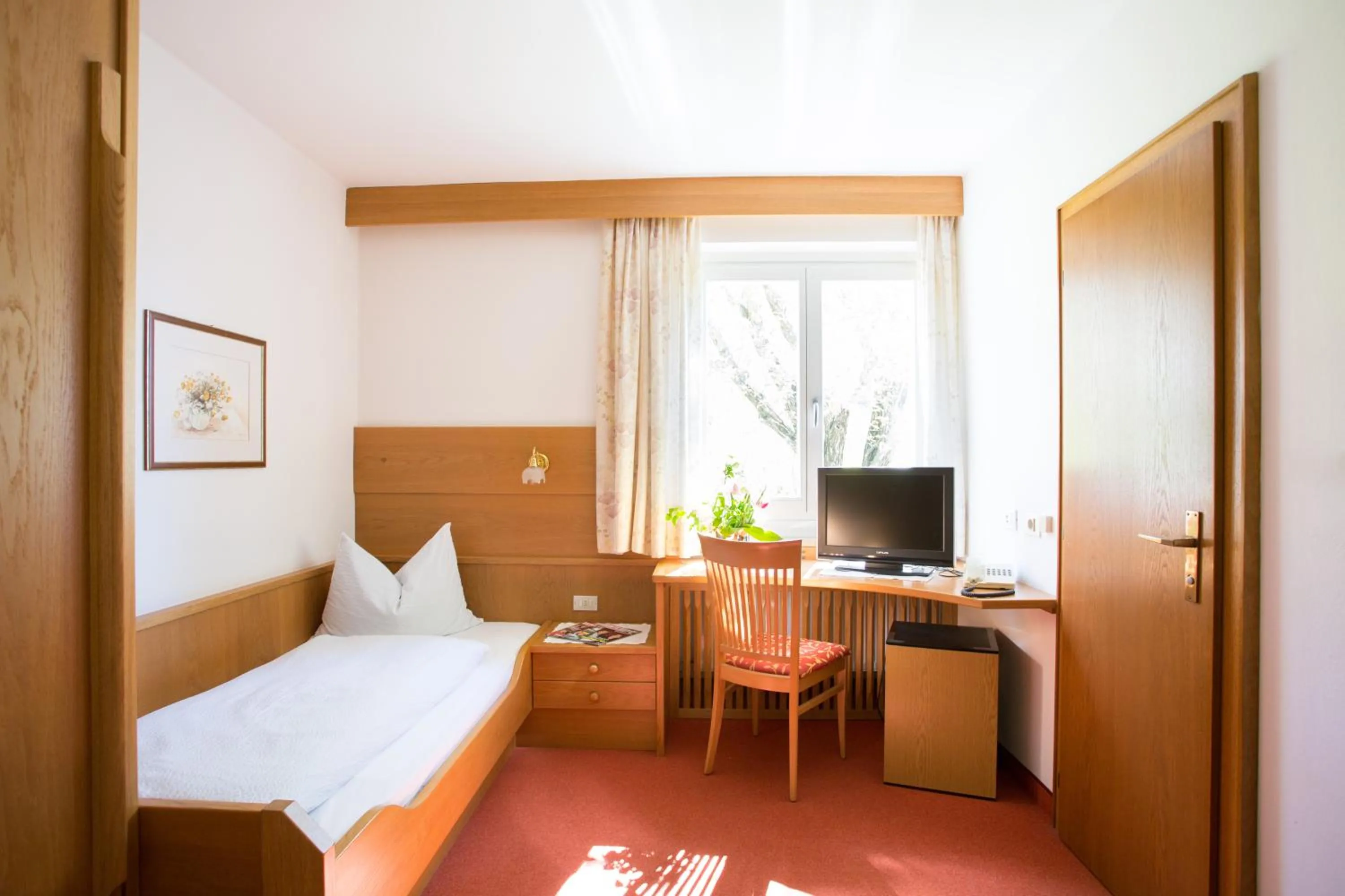 Photo of the whole room, Bed in Garni Pluner