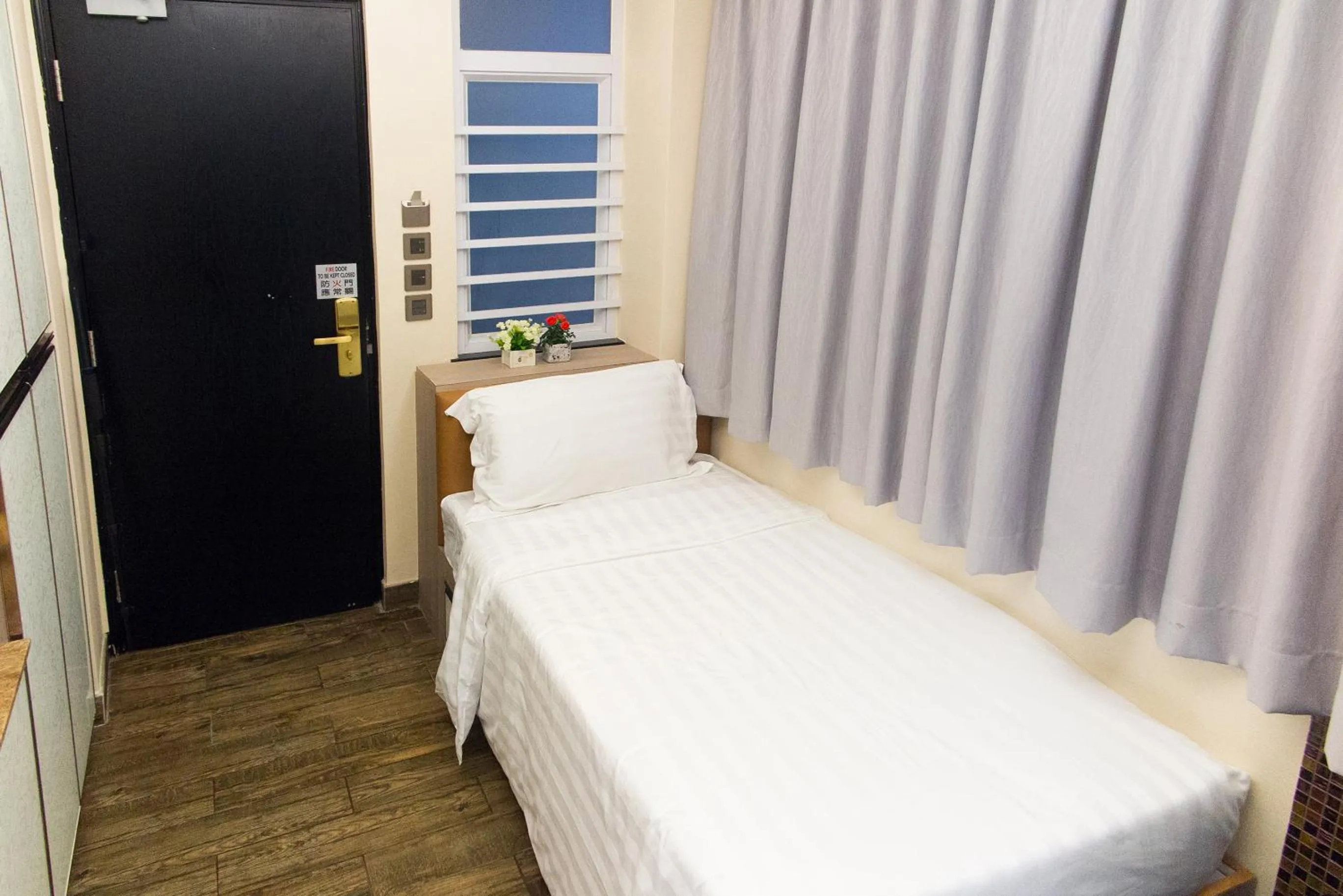 Bed in Metroplace Boutique Hotel