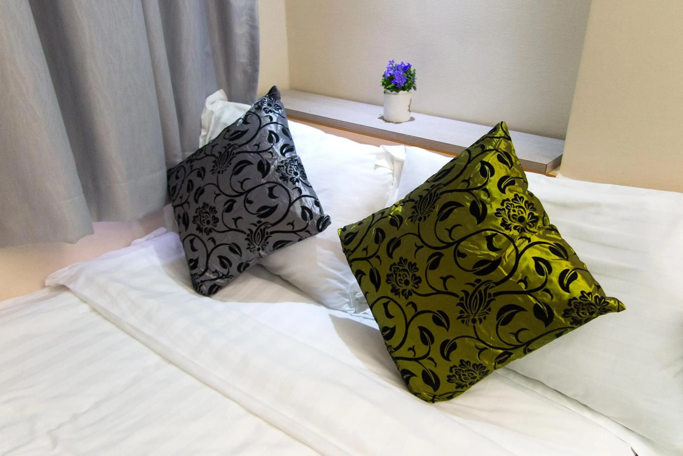 Bed in Metroplace Boutique Hotel