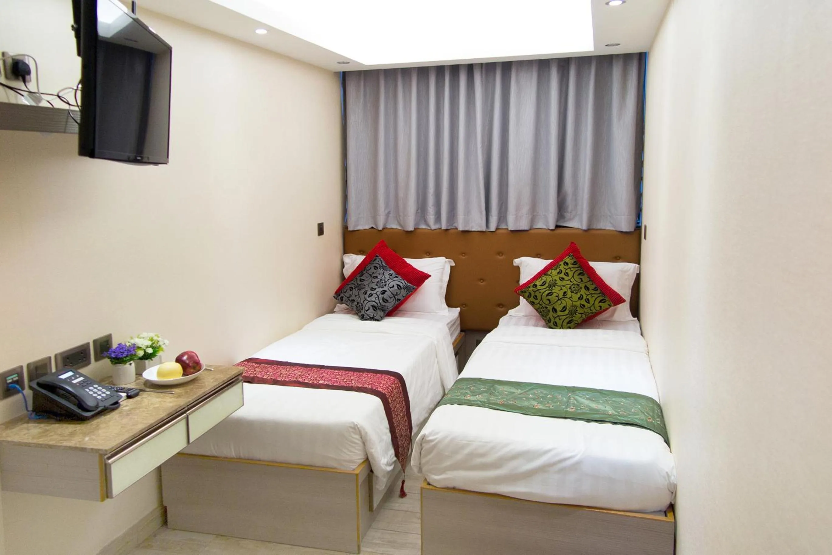 Bed in Metroplace Boutique Hotel