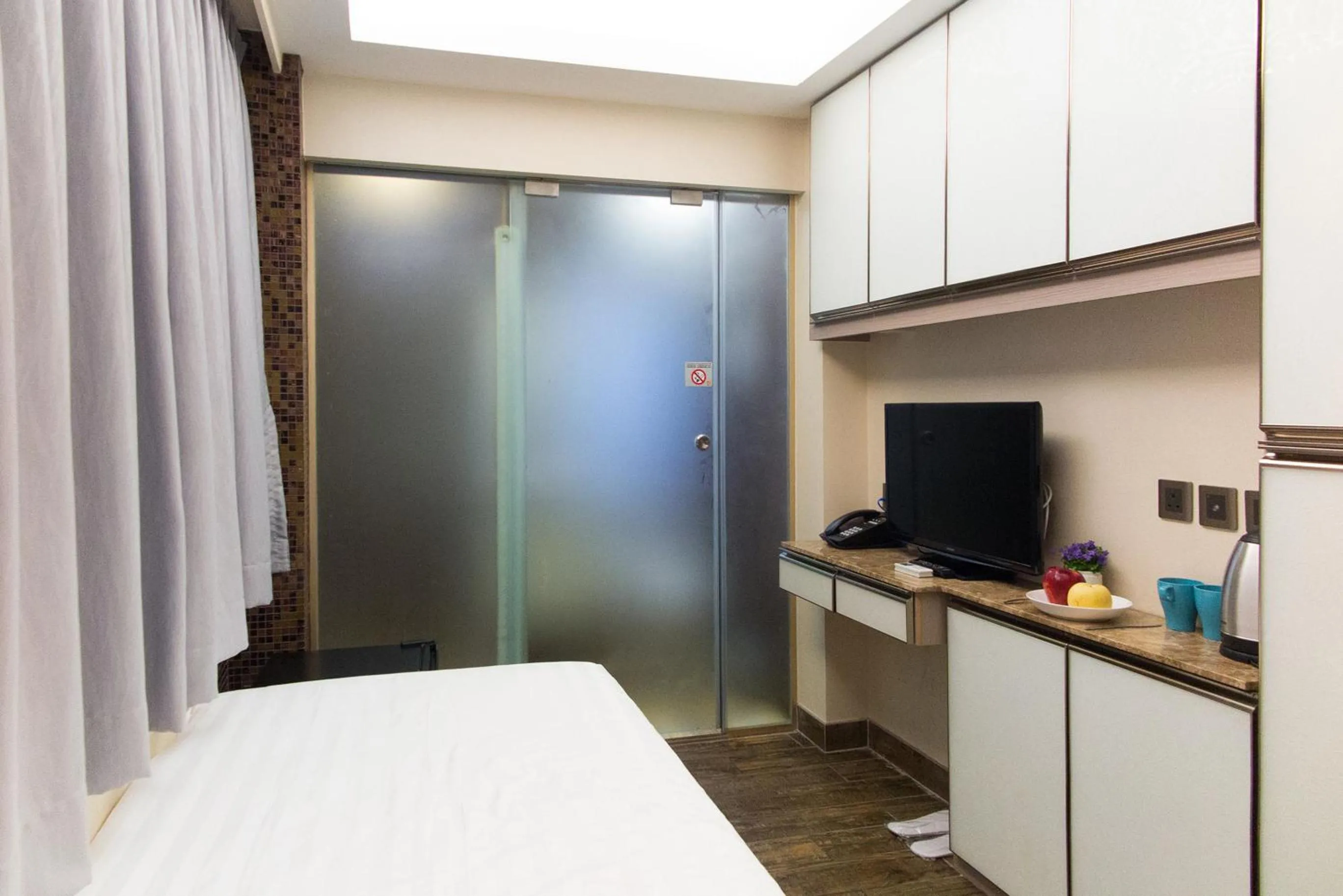 Bed in Metroplace Boutique Hotel