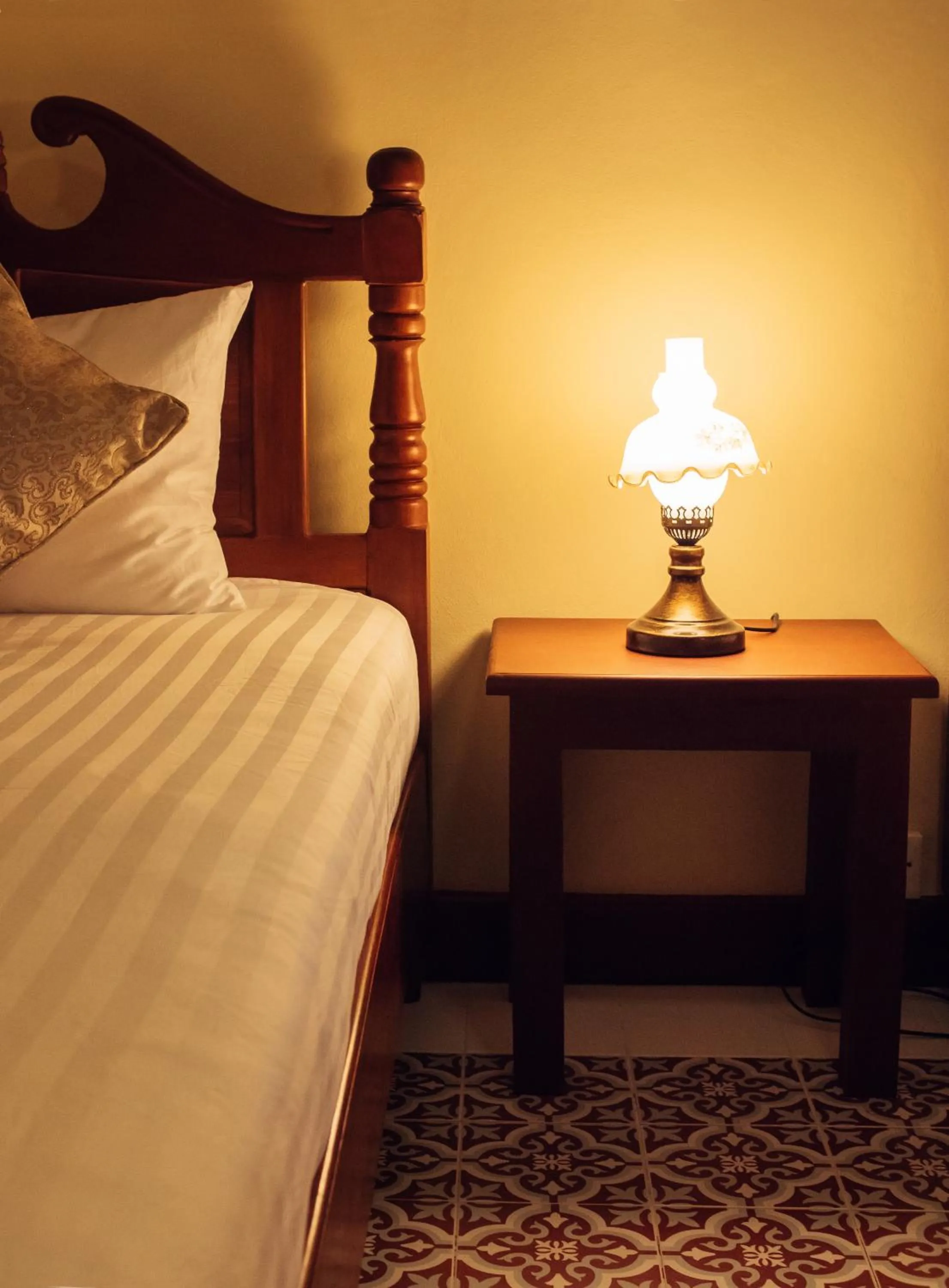 Bed in Le Jardin Hotel