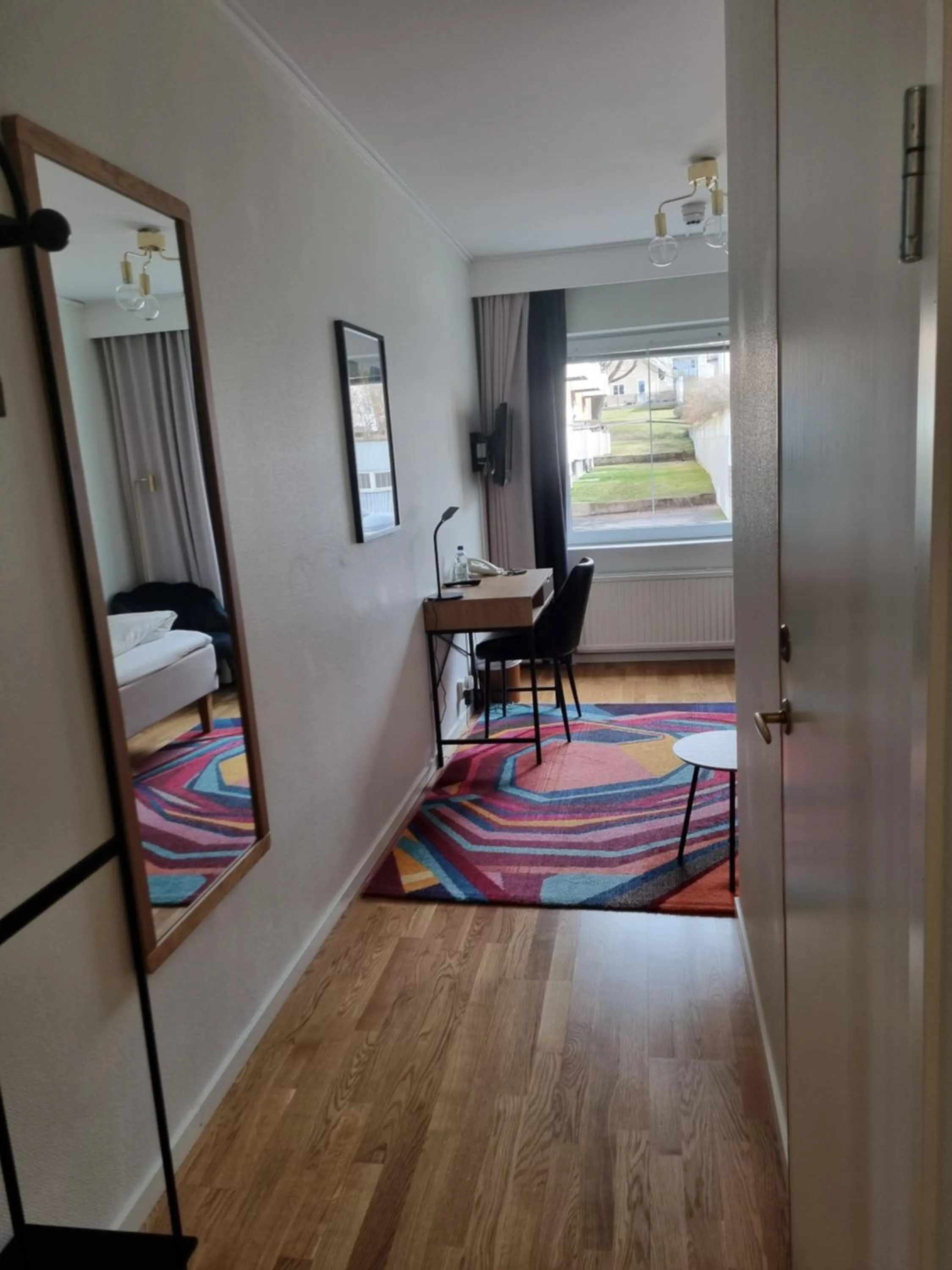 Photo of the whole room, Bed in Mjölby Stadshotell