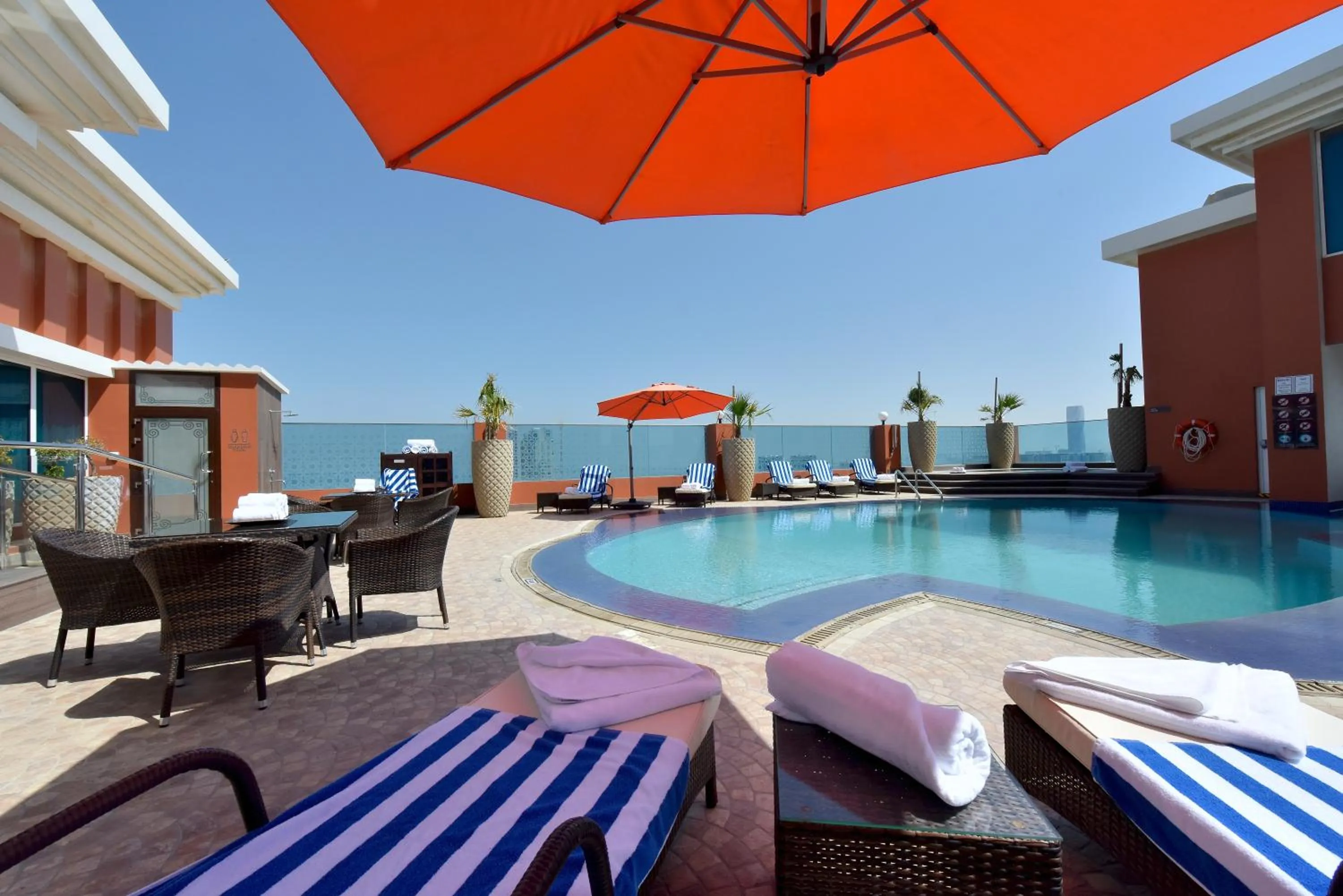 Swimming pool in Ramada by Wyndham Manama City Centre