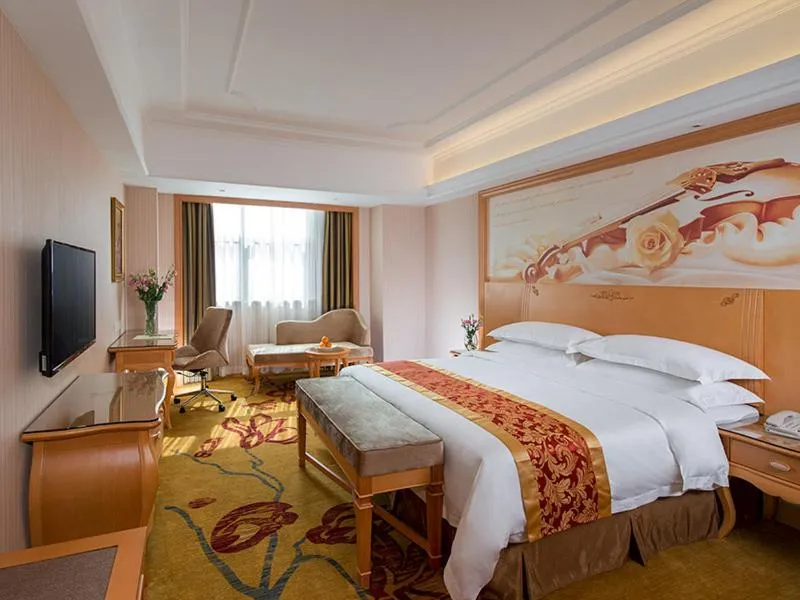 Bed in Vienna Hotel Shenzhen Guangming Guangqiao Road Tianliao