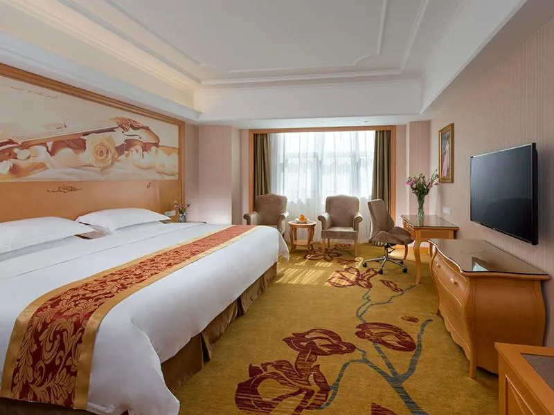 Bed in Vienna Hotel Shenzhen Guangming Guangqiao Road Tianliao