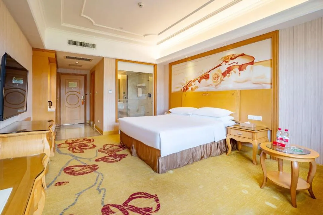 Bed in Vienna Hotel Shenzhen Guangming Guangqiao Road Tianliao