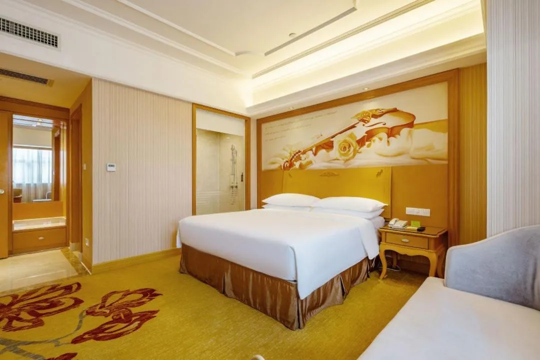 Bed in Vienna Hotel Shenzhen Guangming Guangqiao Road Tianliao