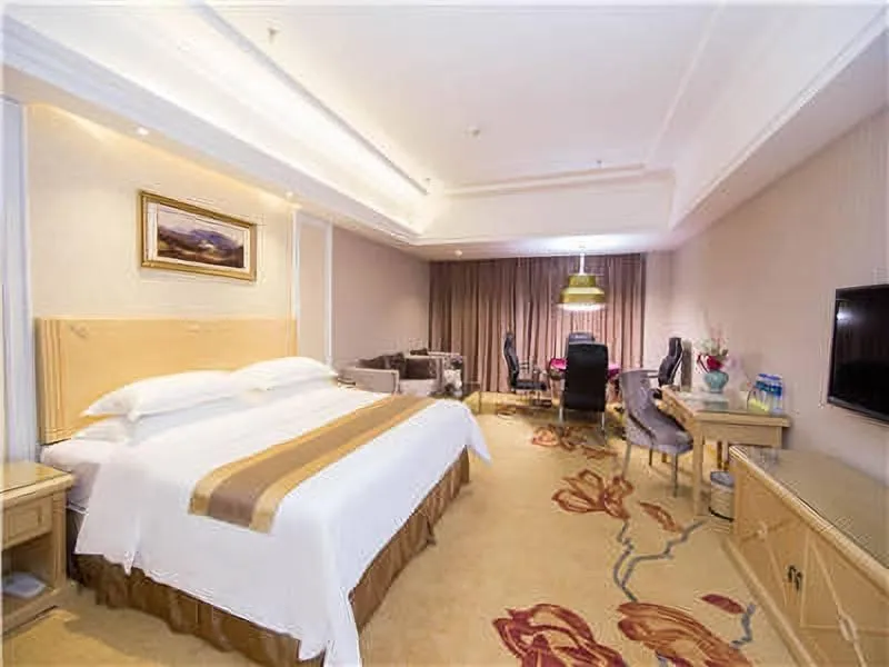 Bed in Vienna Hotel Longchuan