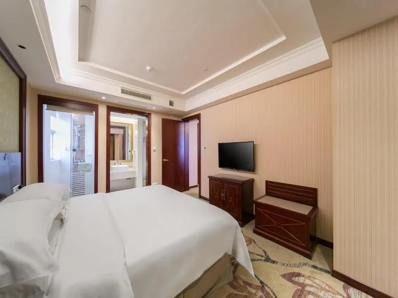 Bed in Vienna Classic Hotel Shizhongshan Avenue