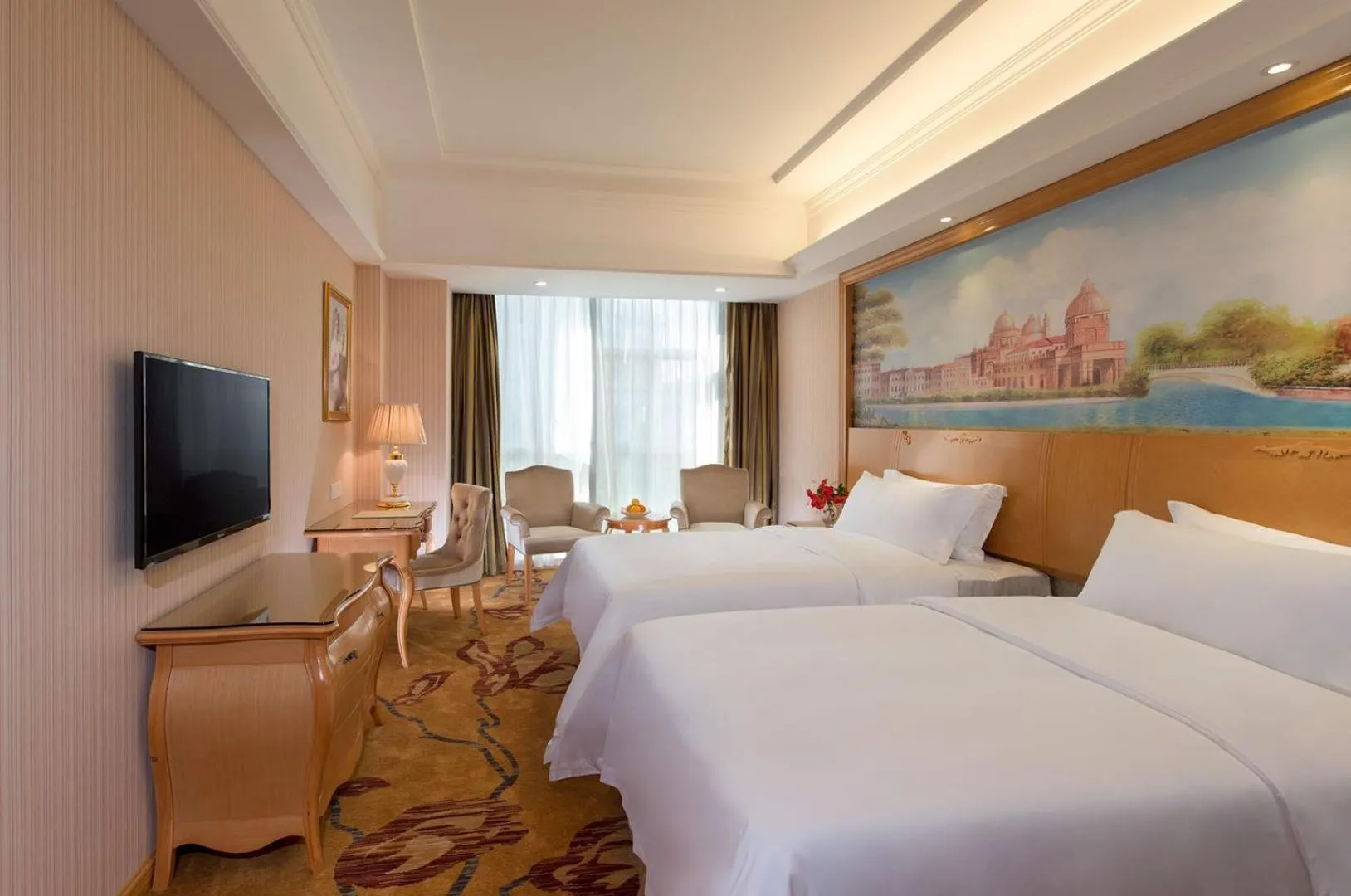 Bed in Vienna Hotel Shenzhen Baoneng City Plaza