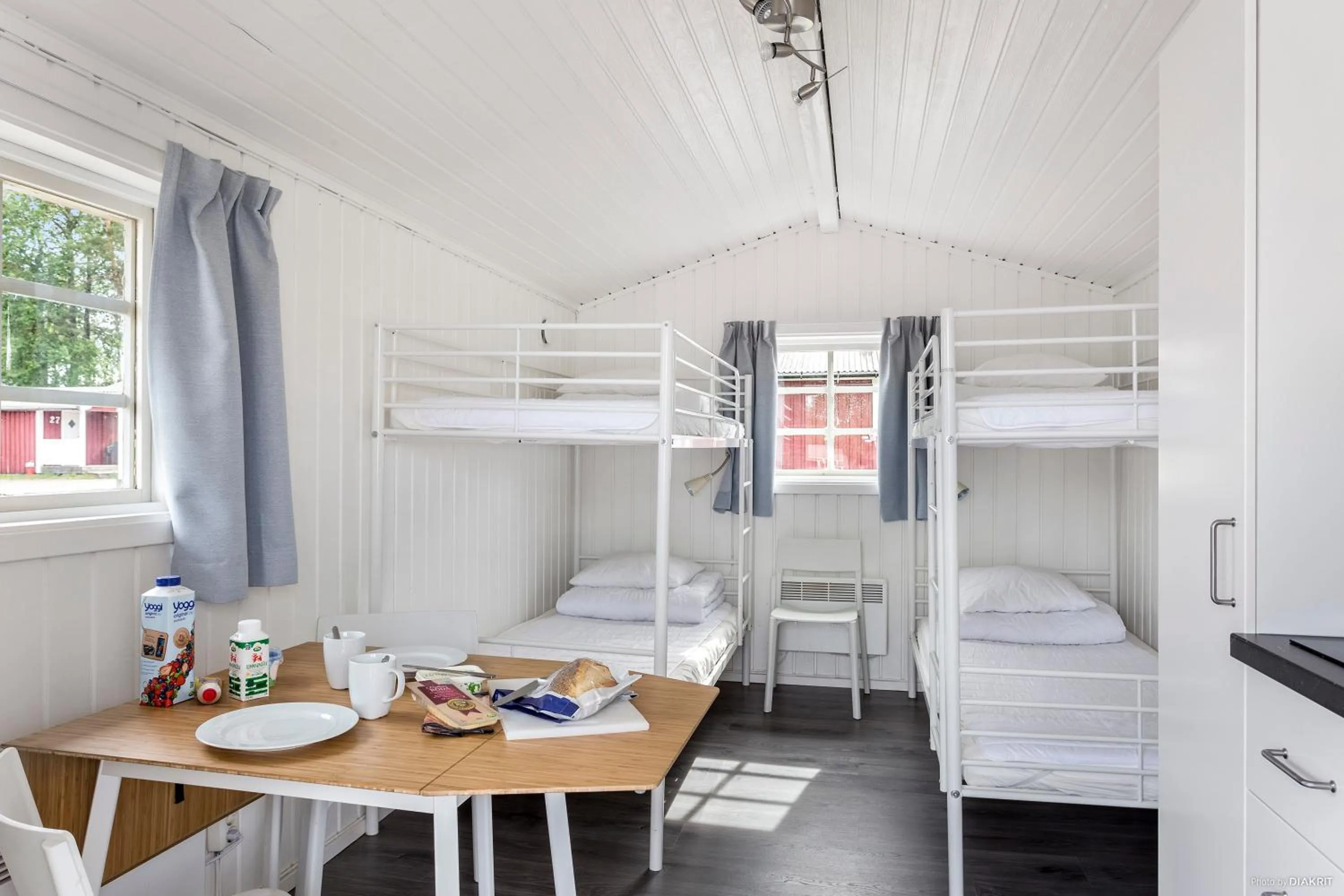 Dining area, Bed in First Camp Skutberget-Karlstad