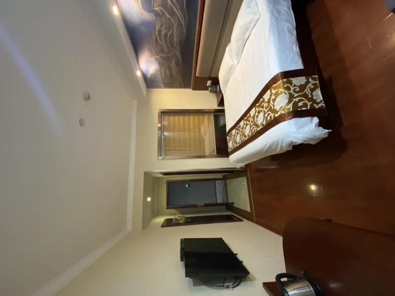 Bed in GreenTree ShangHai JinShan Wanda Plaza Longxiang Road Express Hotel