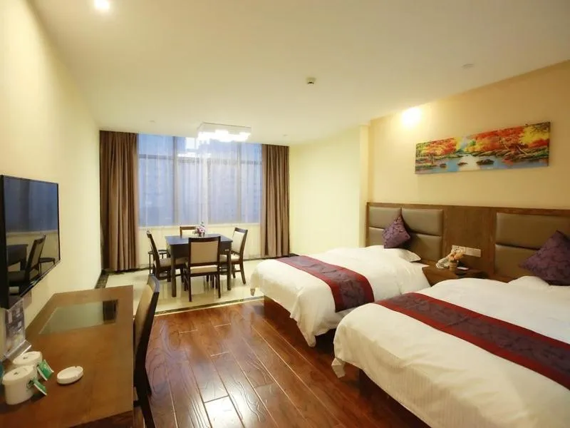 Bed in GreenTree Inn JiangSu NanTong HaiMen Shanghe Plaza Express Hotel