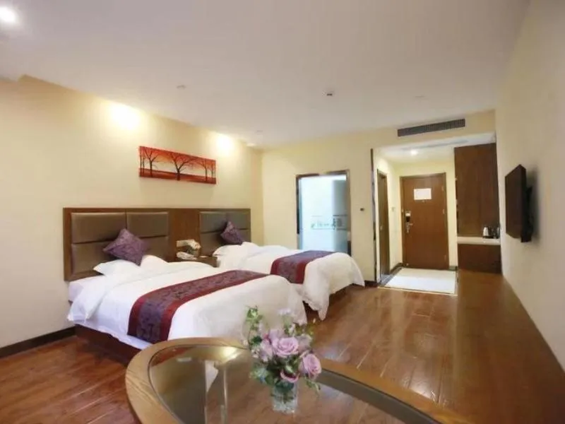 Bed in GreenTree Inn JiangSu NanTong HaiMen Shanghe Plaza Express Hotel