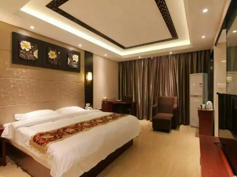 Bed in GreenTree Inn JiangSu ZHenjiang Jurong Yalong Business Hotel