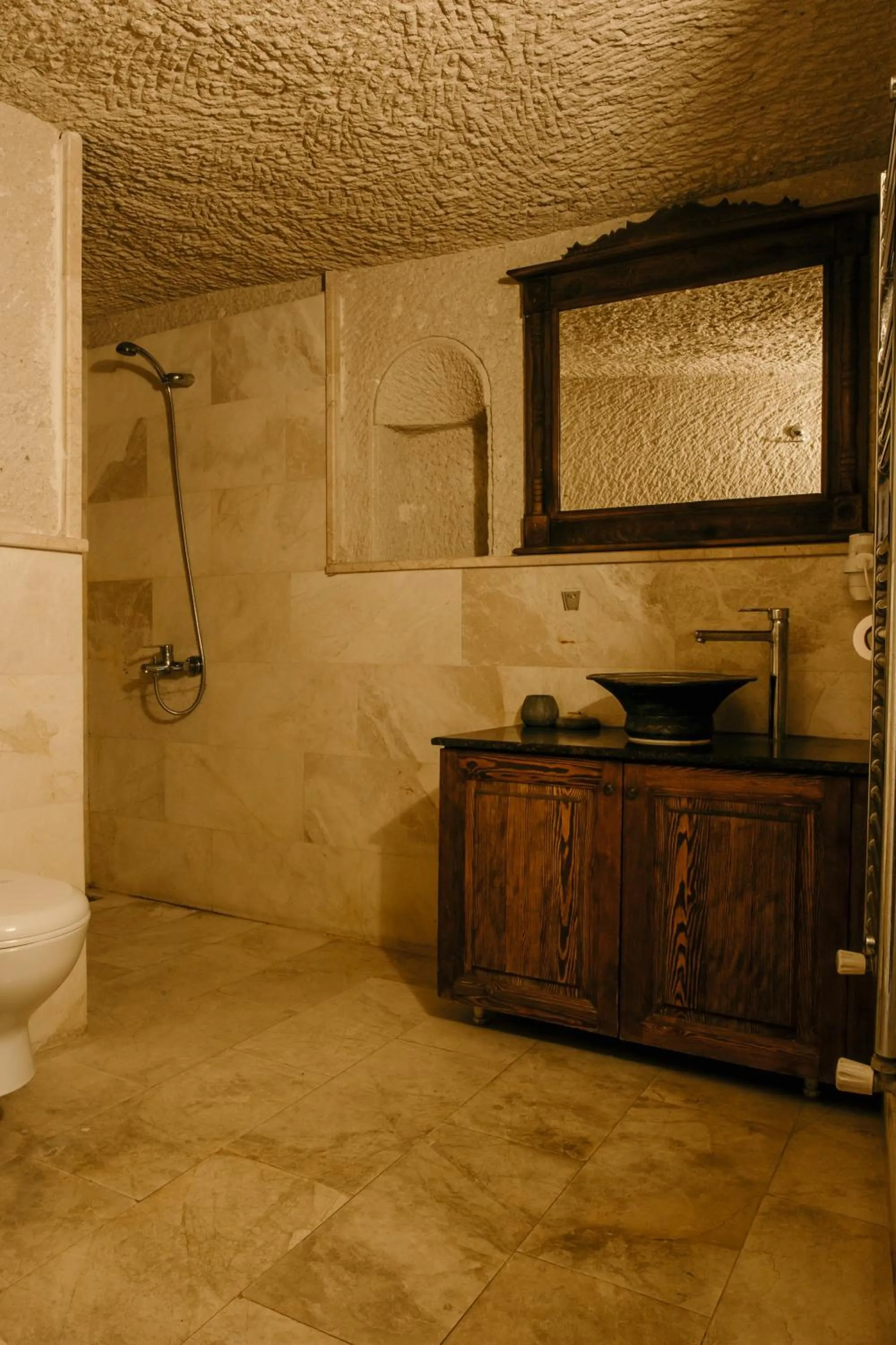 Shower in Village Cave House Hotel