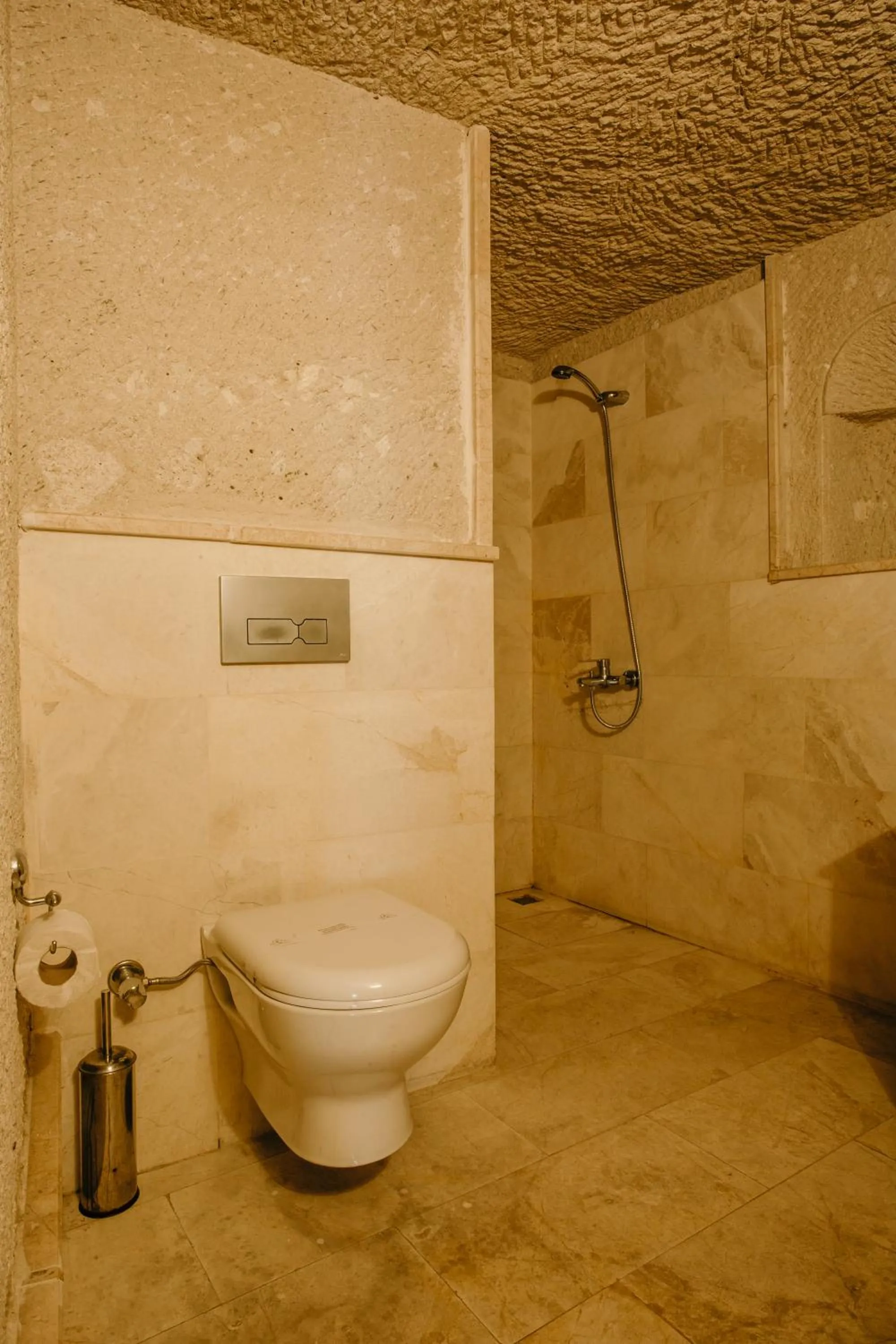 Shower in Village Cave House Hotel