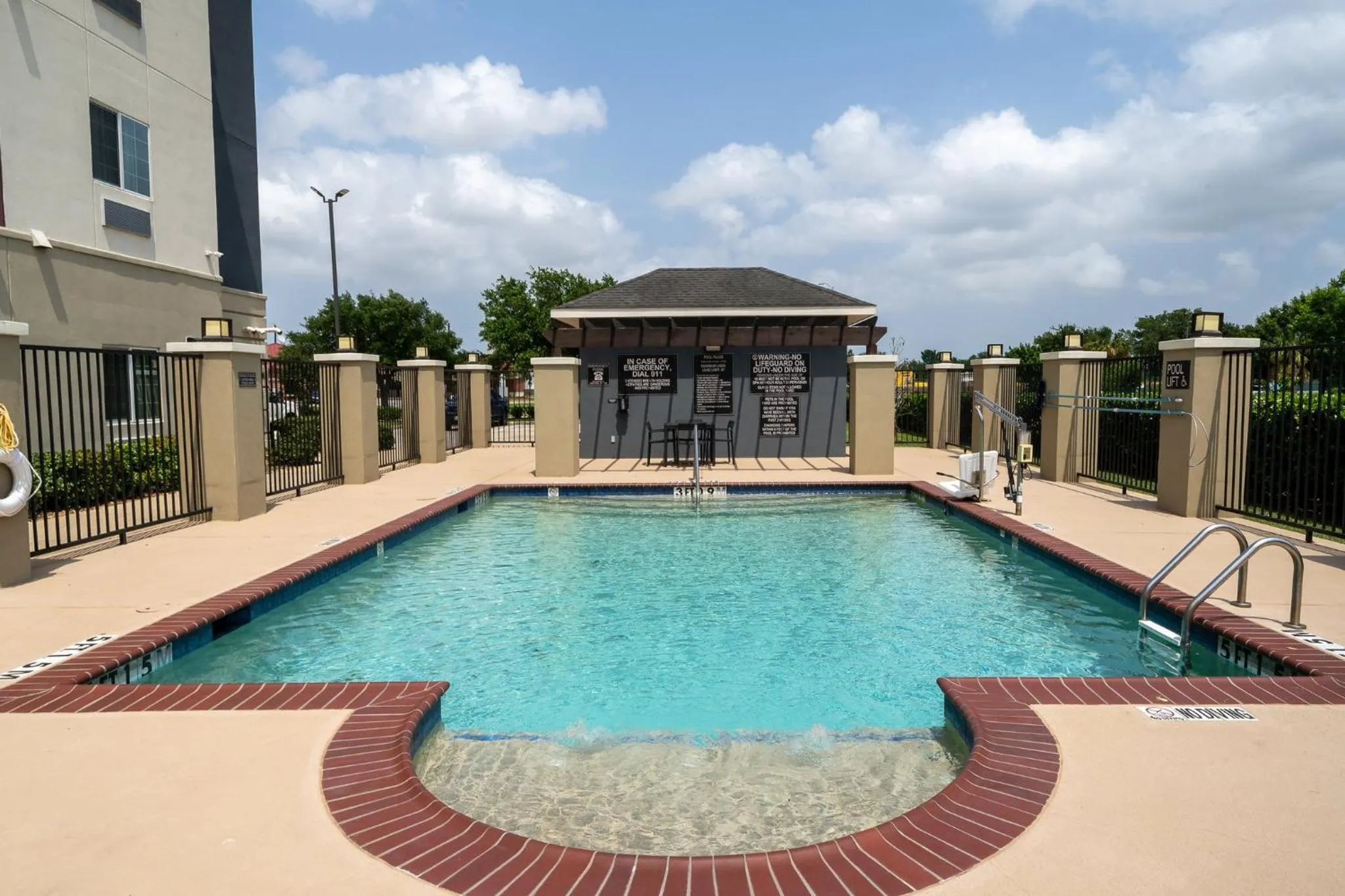 Swimming pool in Candlewood Suites Deer Park by IHG