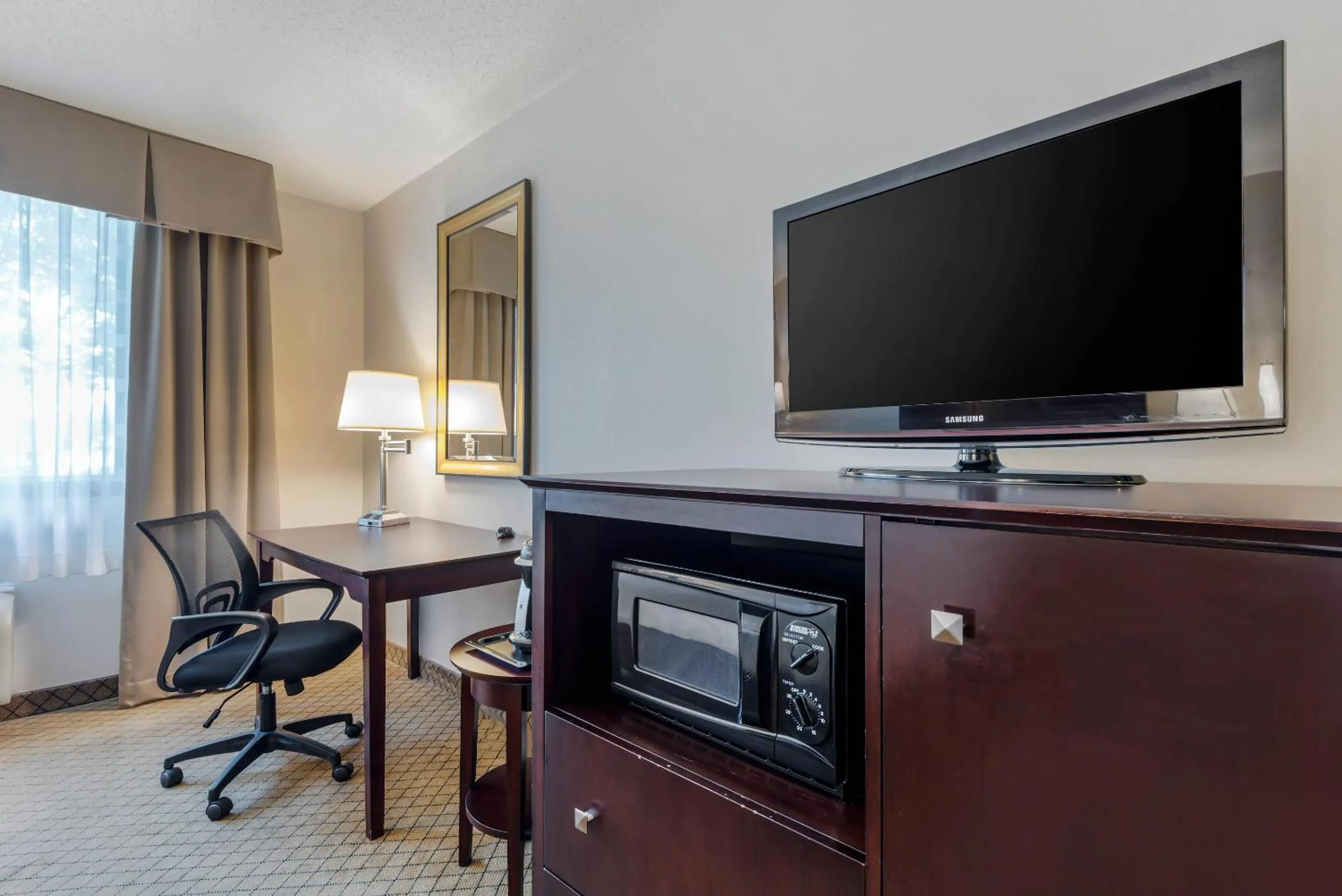Bedroom in Clarion Inn Elmira-Horseheads