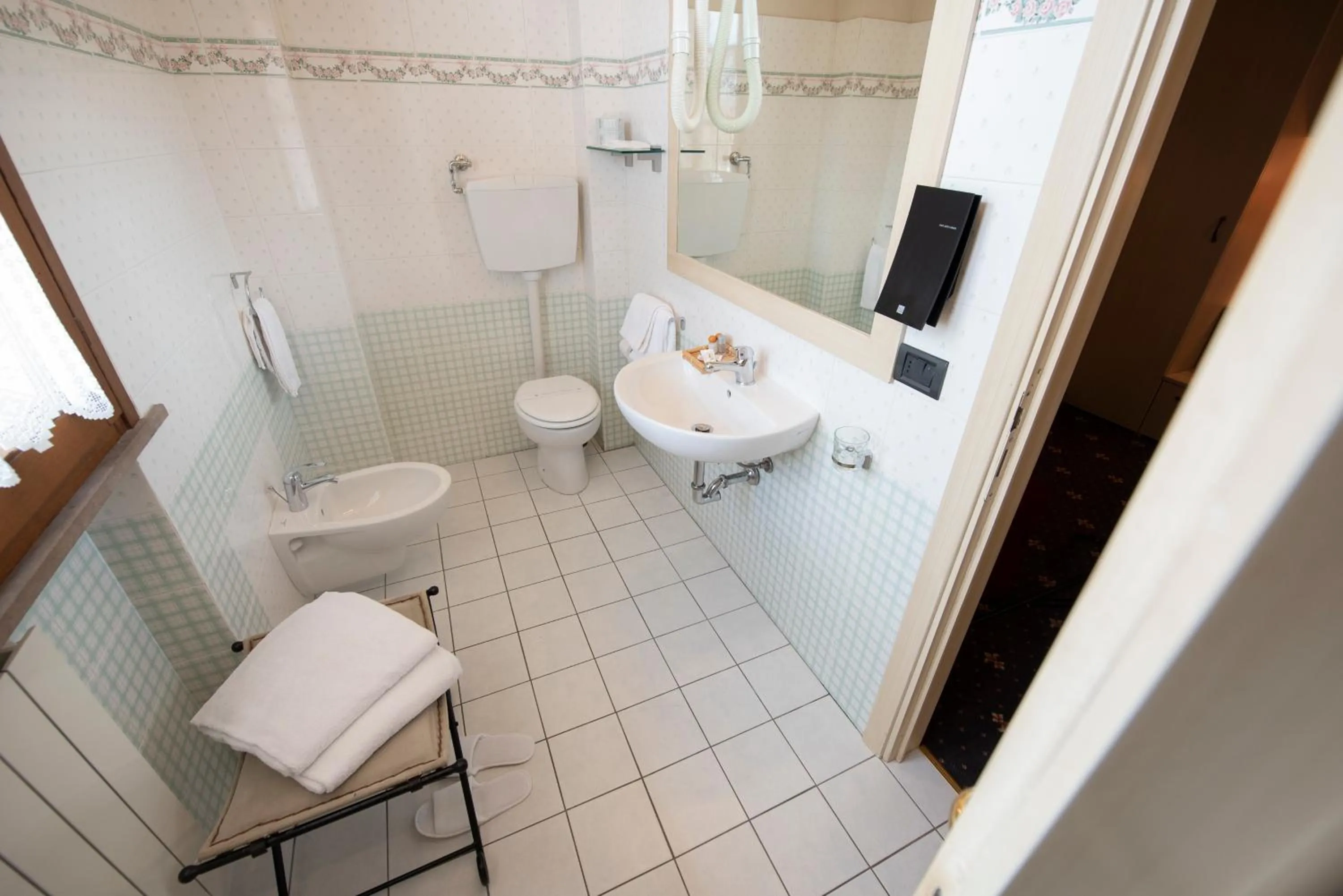 Bathroom in Holiday Rooms Antica Badia