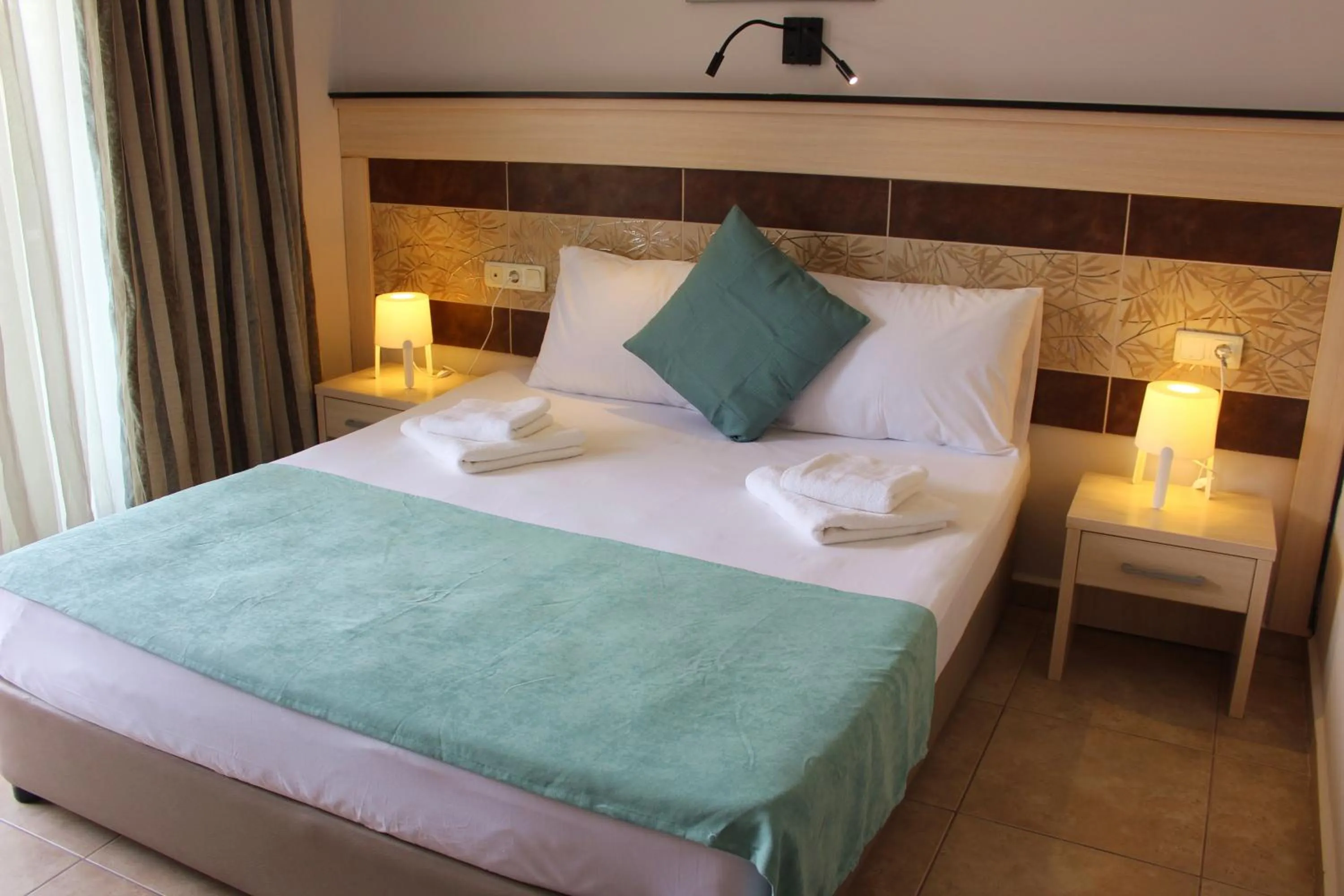 Bed in Avlu Hotel