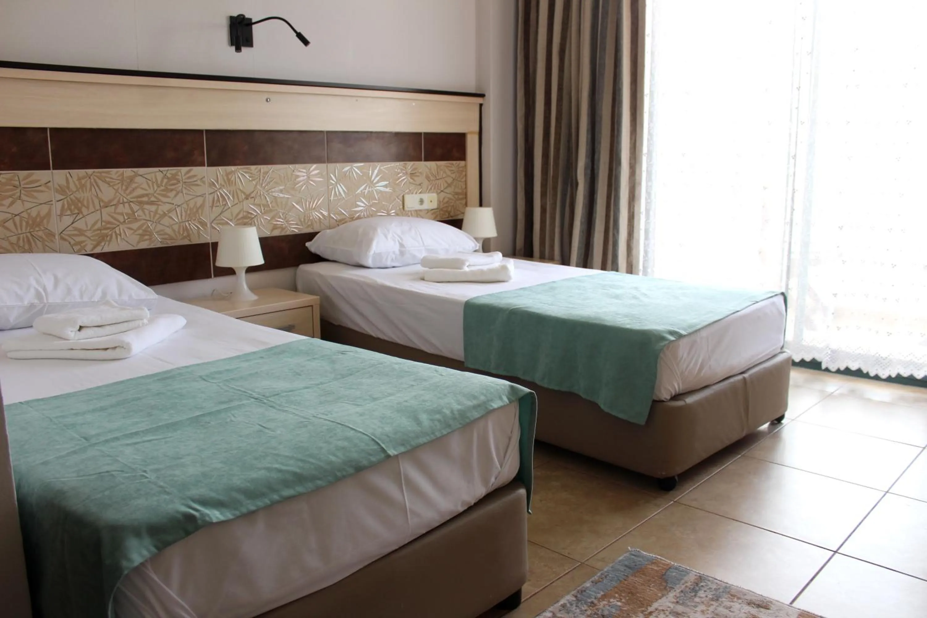 Bed in Avlu Hotel