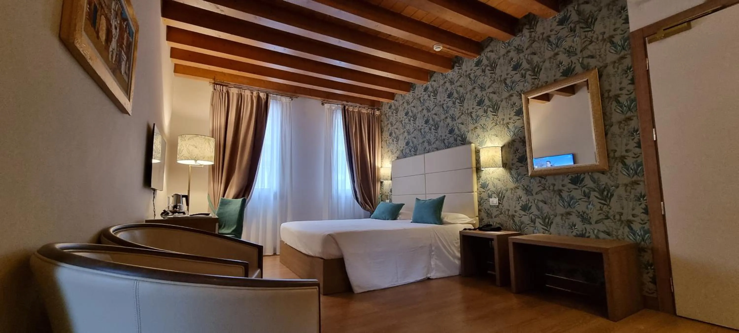 Bed in UNAHOTELS Eco Hotel Villa Costanza Venezia