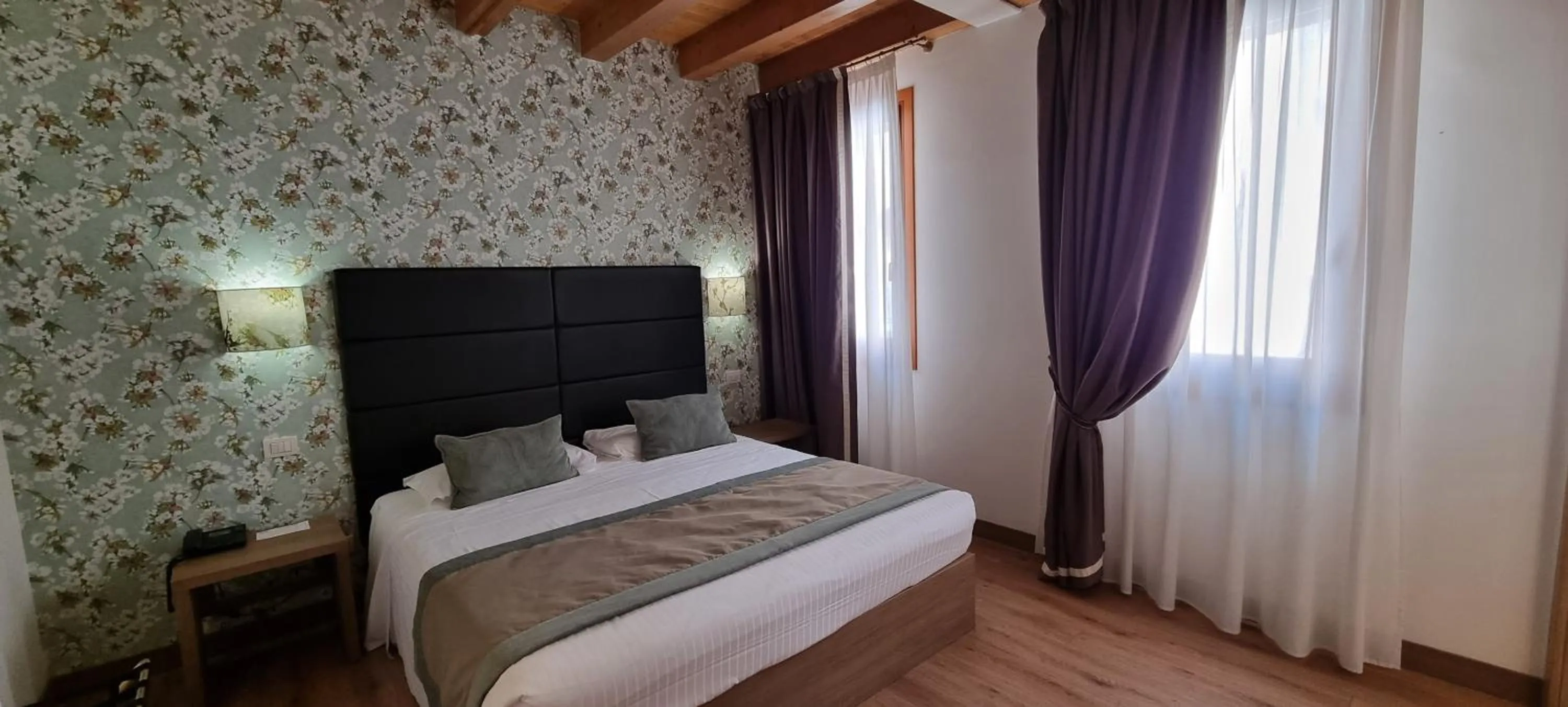 Bed in UNAHOTELS Eco Hotel Villa Costanza Venezia