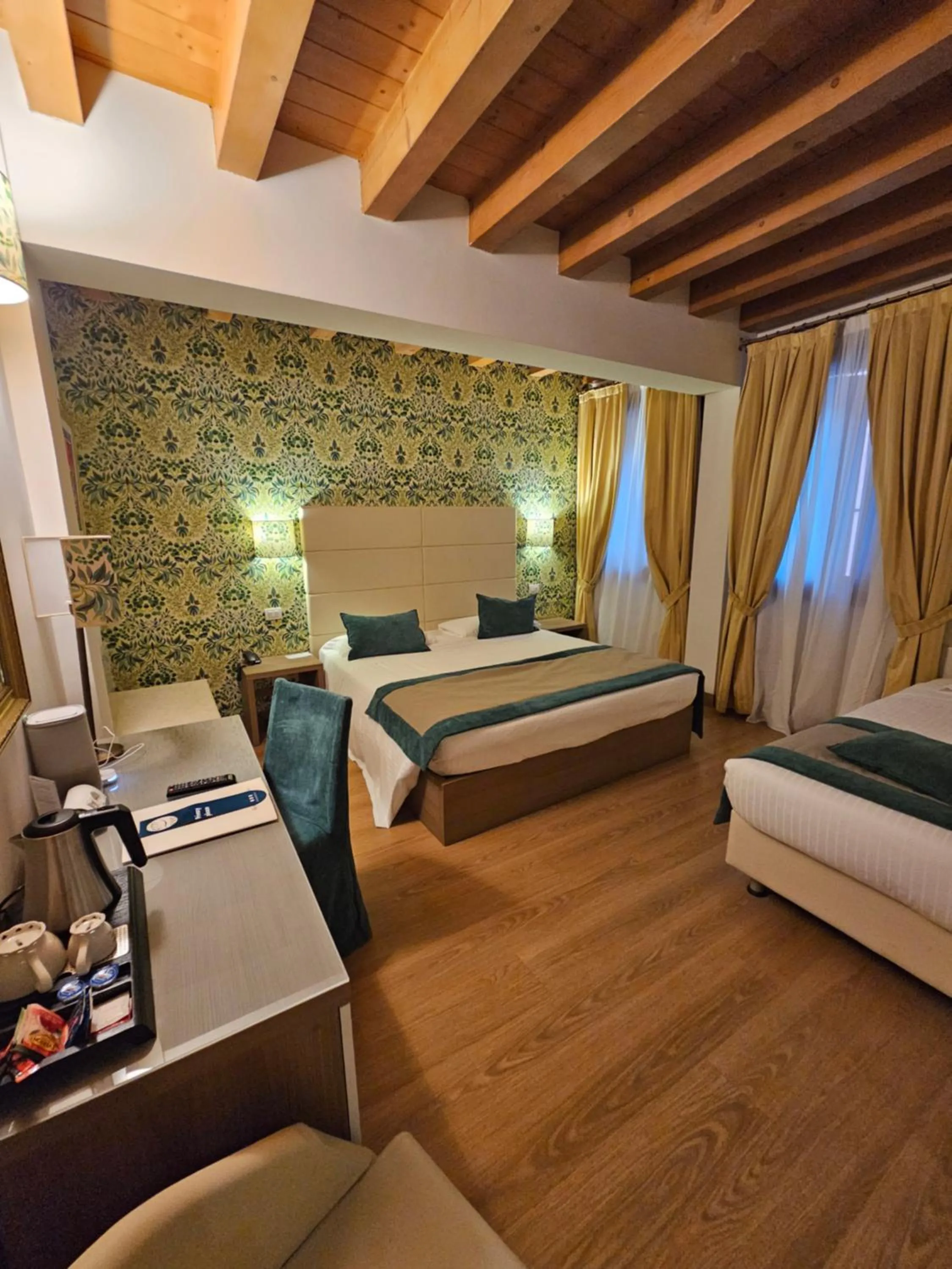 Bed in UNAHOTELS Eco Hotel Villa Costanza Venezia