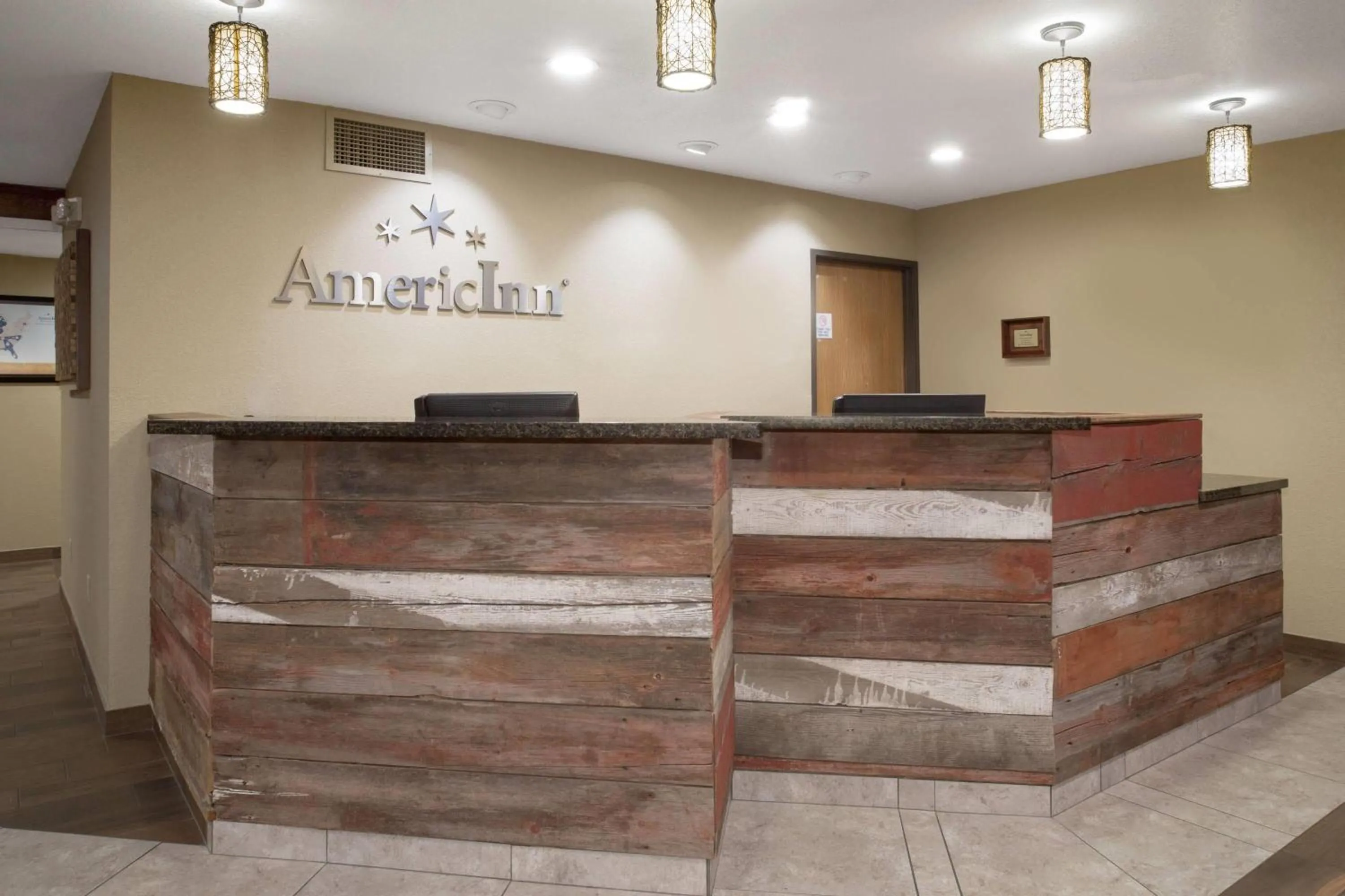 Lobby or reception in AmericInn by Wyndham Mount Pleasant