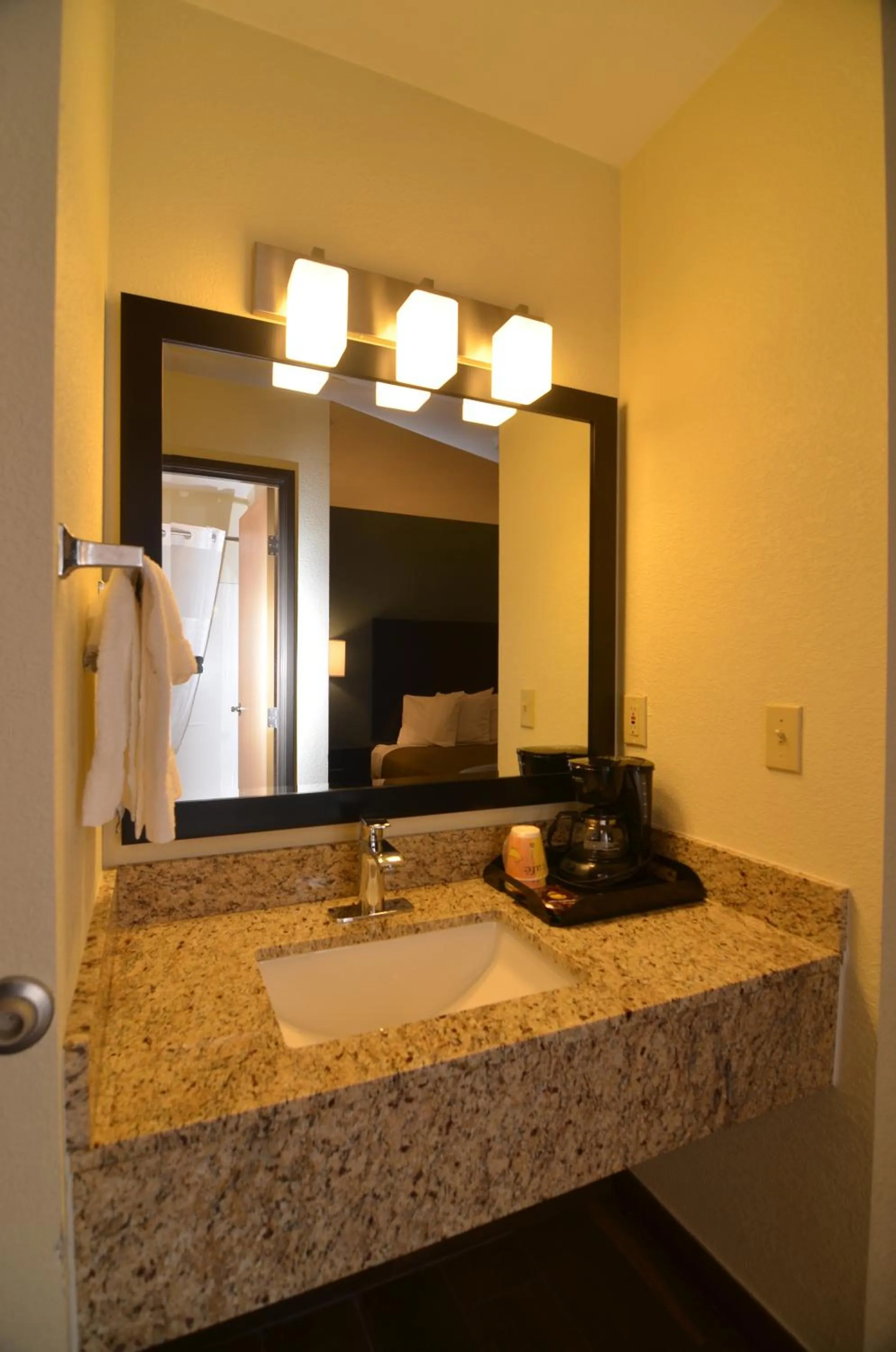 Bathroom in AmericInn by Wyndham Mount Pleasant
